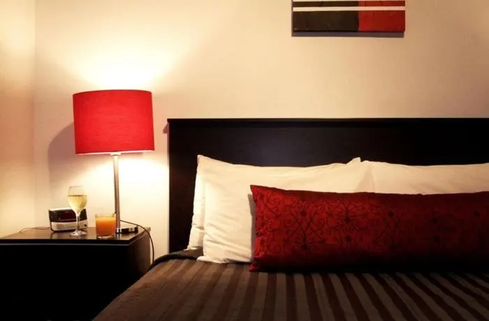 Decorative detail, Bed in 83 By The Sea Motor Lodge