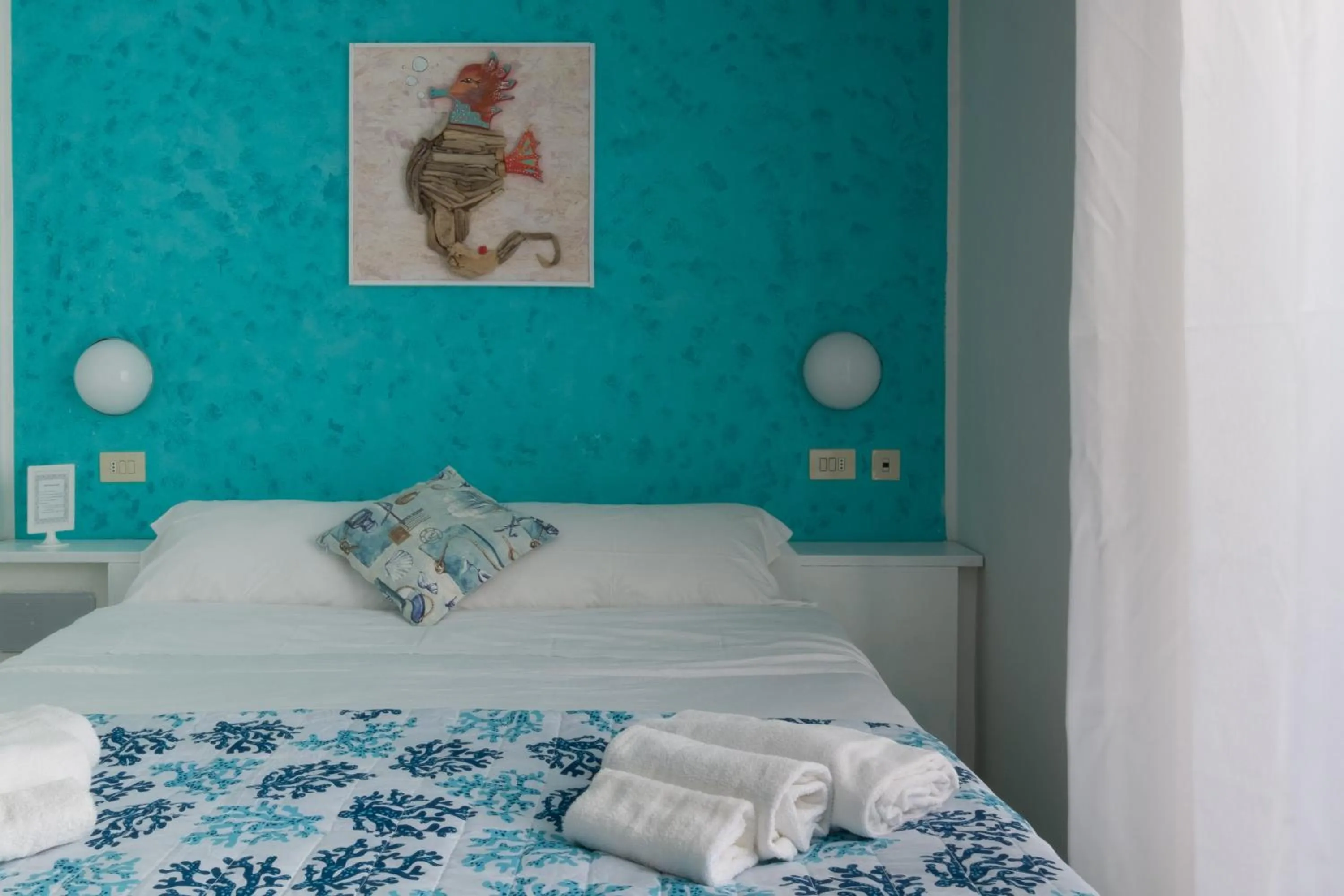 Bed in Hotel Punto Verde