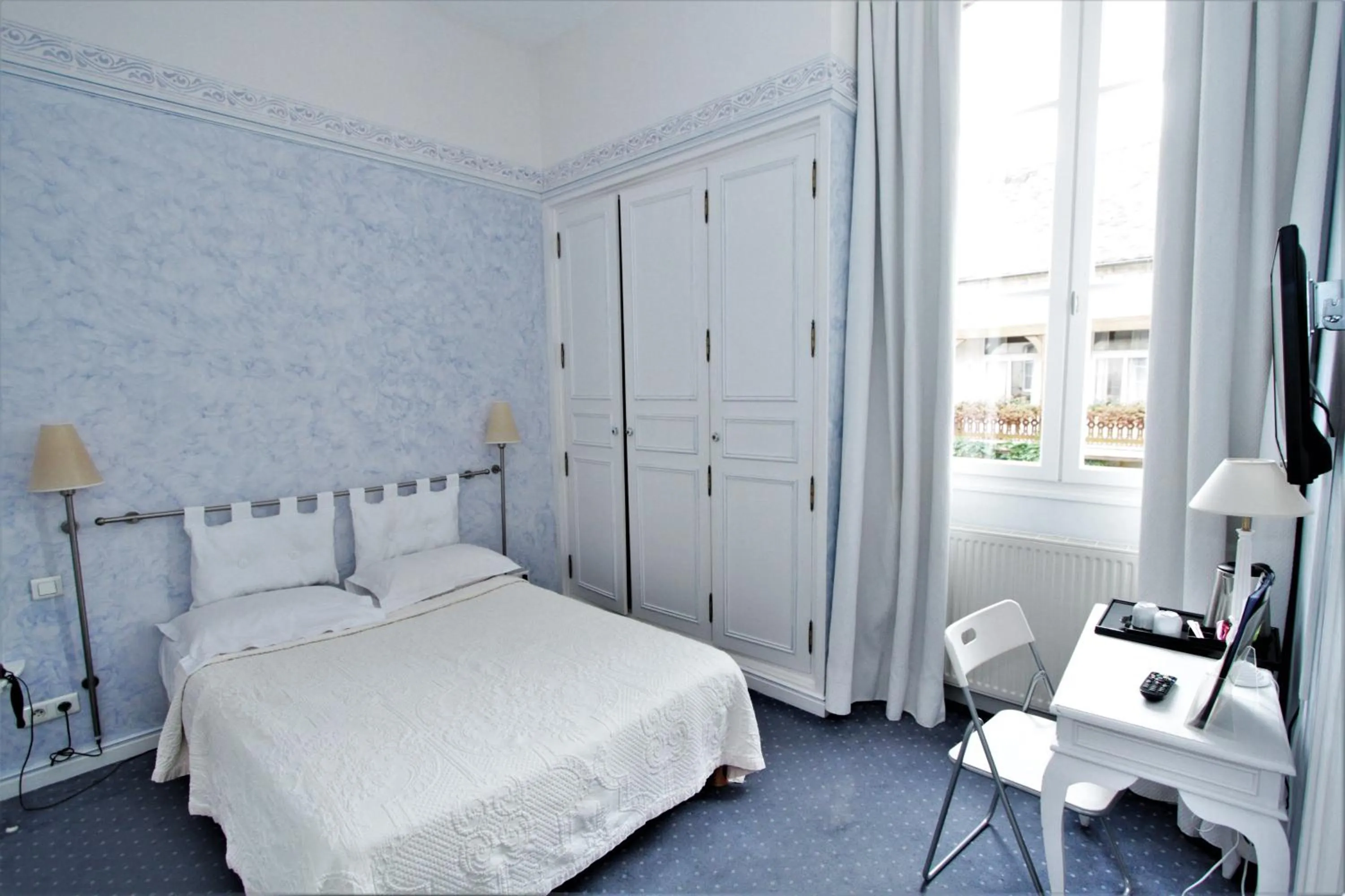 Bed in Hôtel Le Régent