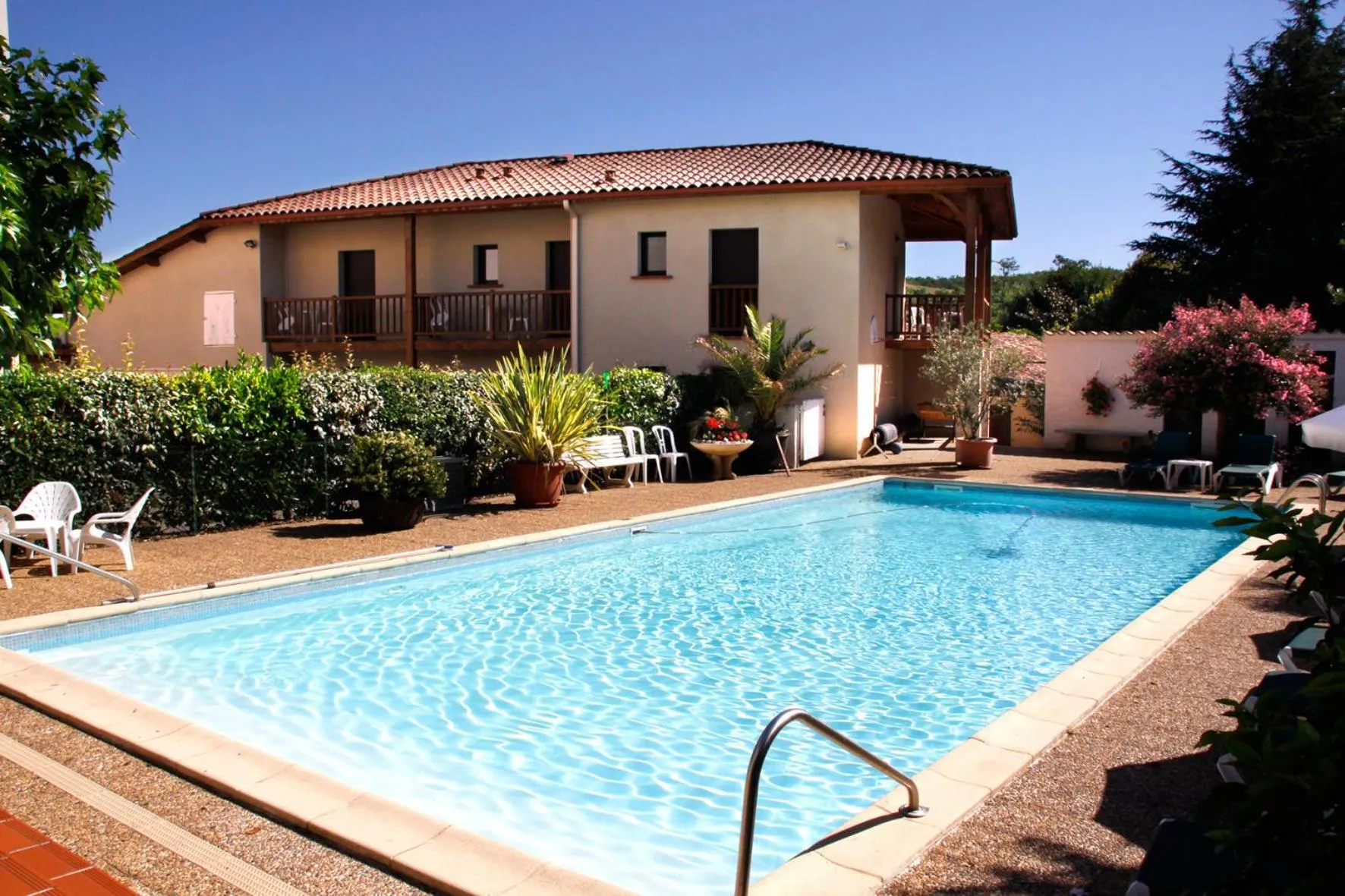 Swimming pool in Chez Terrassier - Logis Hôtels - Hotel et Restaurant