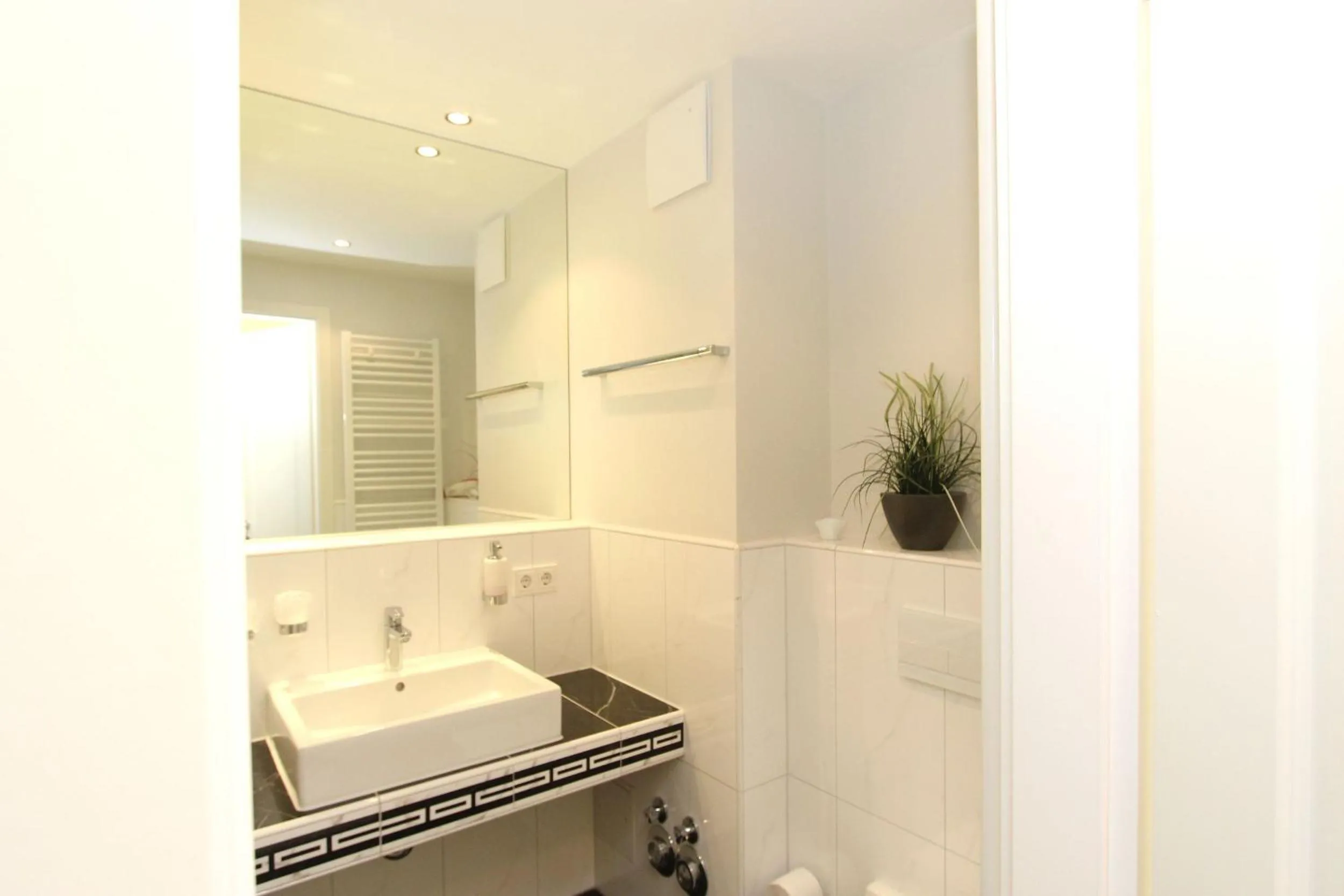 Bathroom in Strandresidenz Baabe Ferienwohnung 1-29 mit Sauna- und Schwimmbadnutzung im Haus