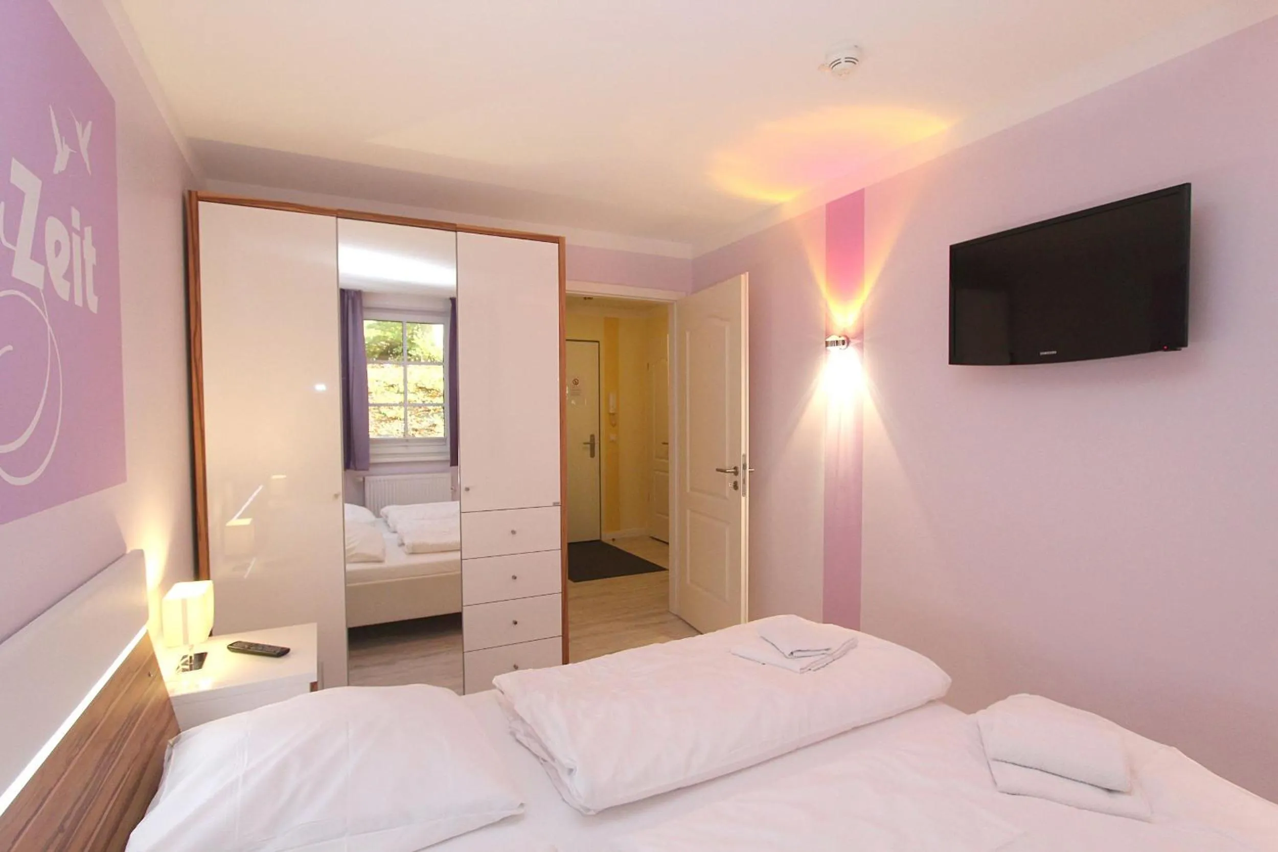 Bedroom, Bed in Strandresidenz Baabe Ferienwohnung 1-29 mit Sauna- und Schwimmbadnutzung im Haus