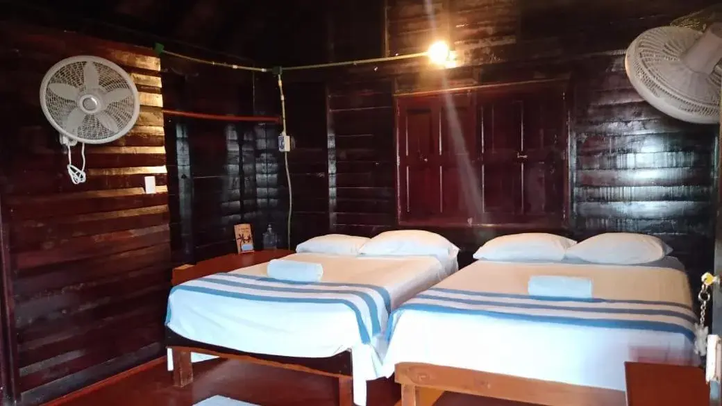 Bed in Cabañas El Cuyo Bed in Cabañas El Cuyo