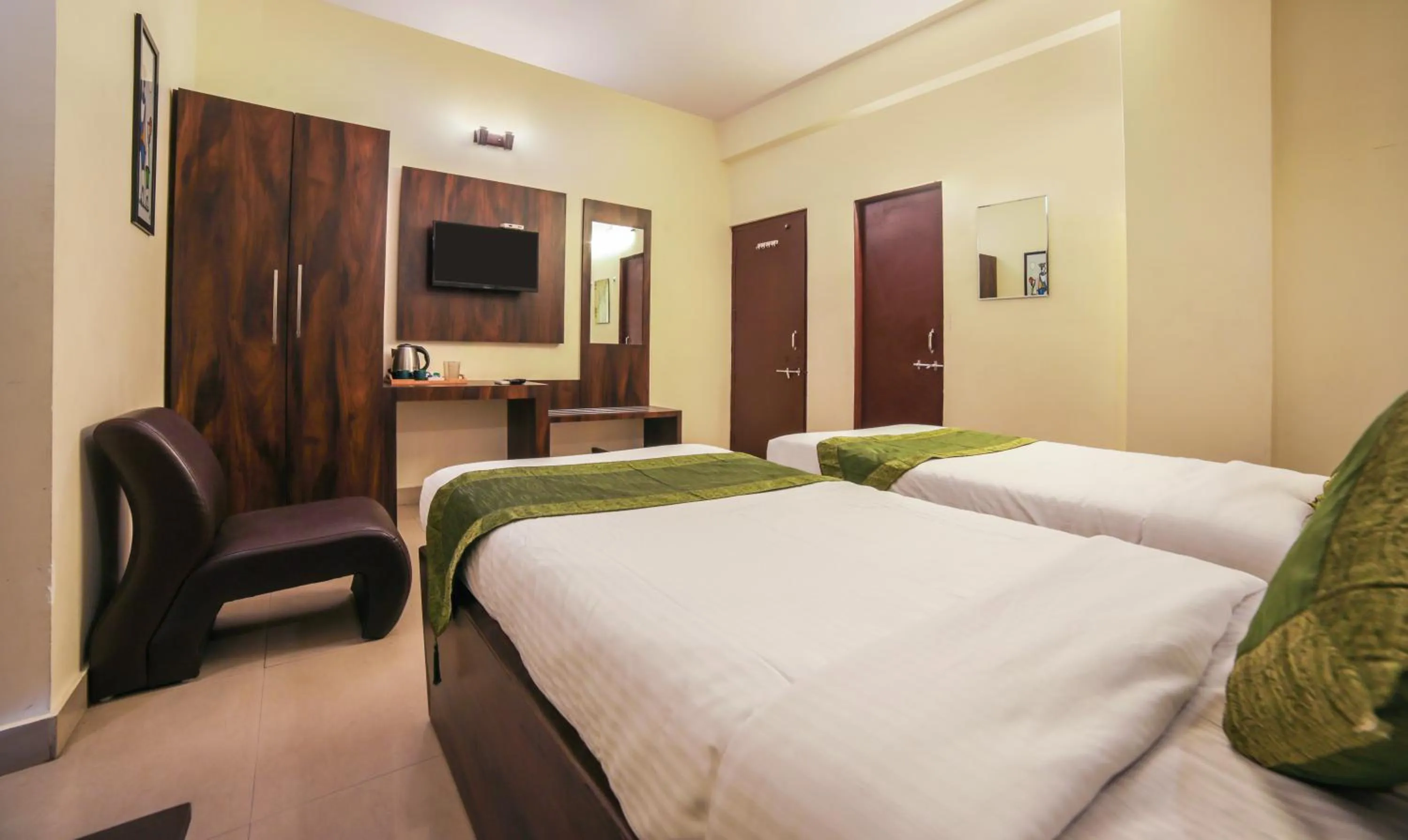 Bedroom, Bed in Treebo Ivory House