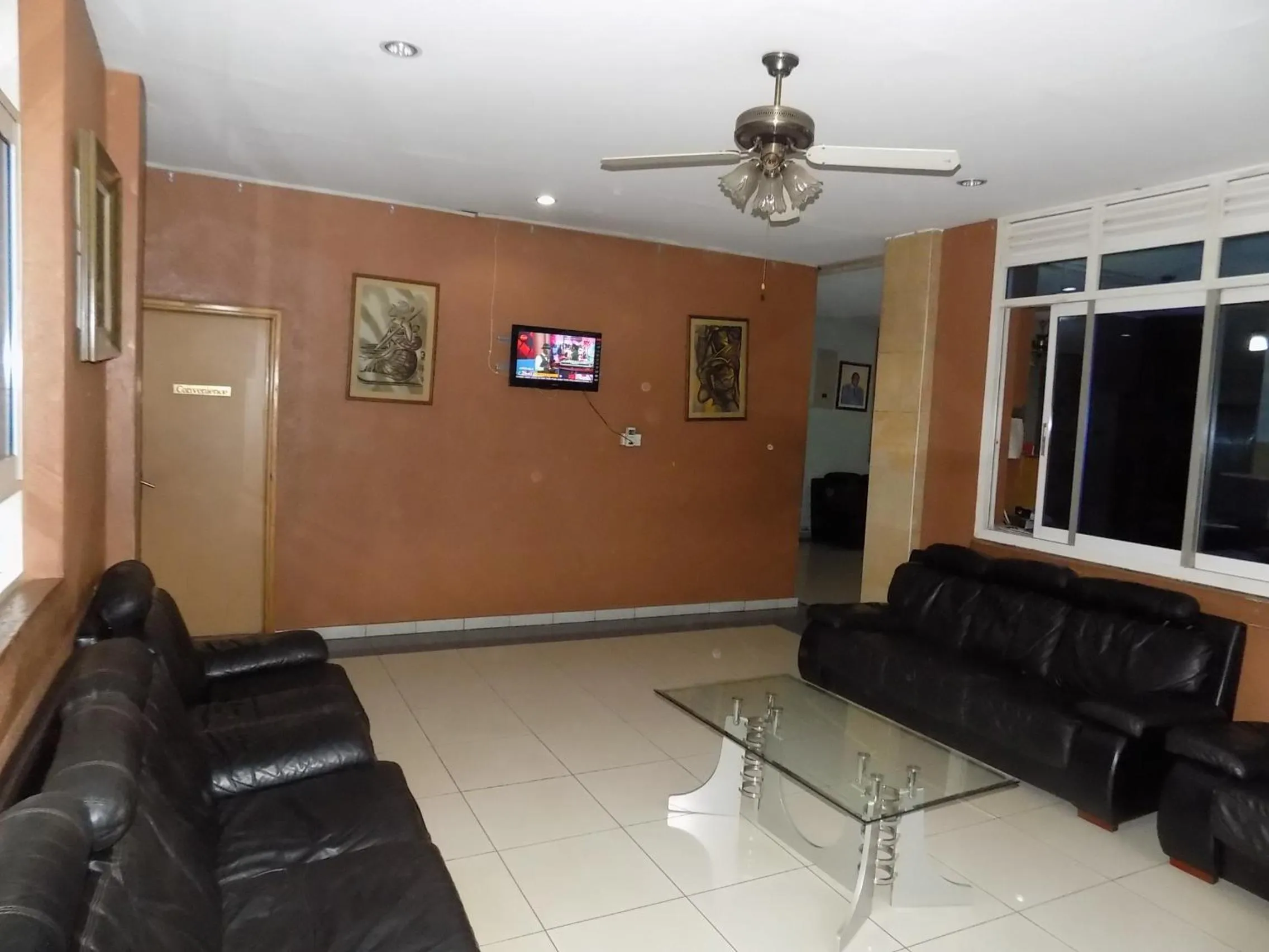 Communal lounge/ TV room in Aponye Hotel Kampala