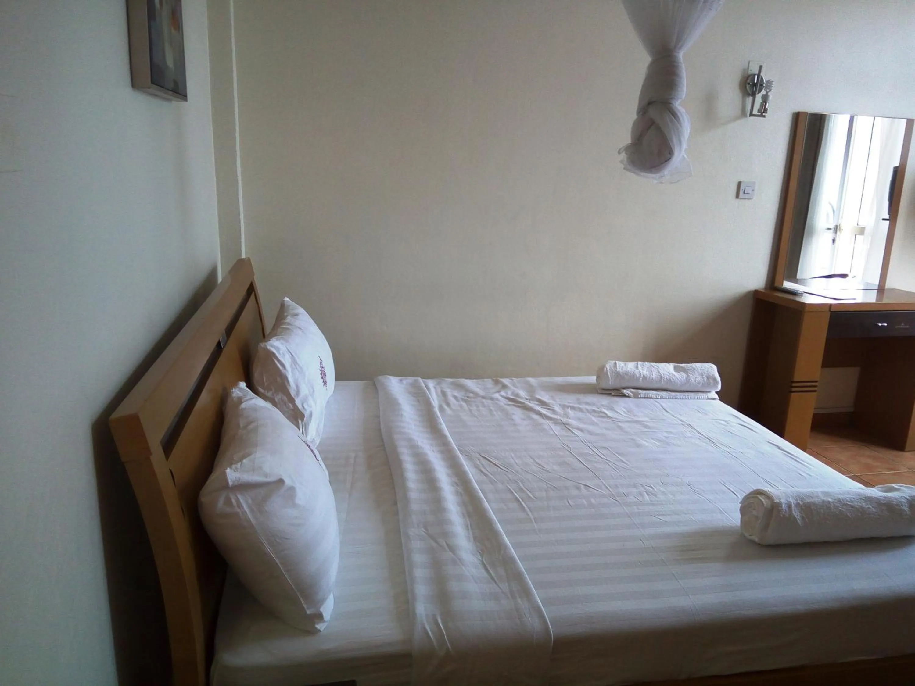 Bed in Aponye Hotel Kampala