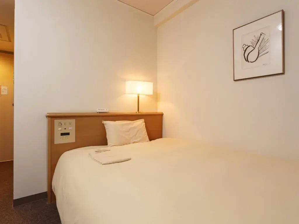 Bed in AkishimaStationHotel TOKYO Bed in AkishimaStationHotel TOKYO