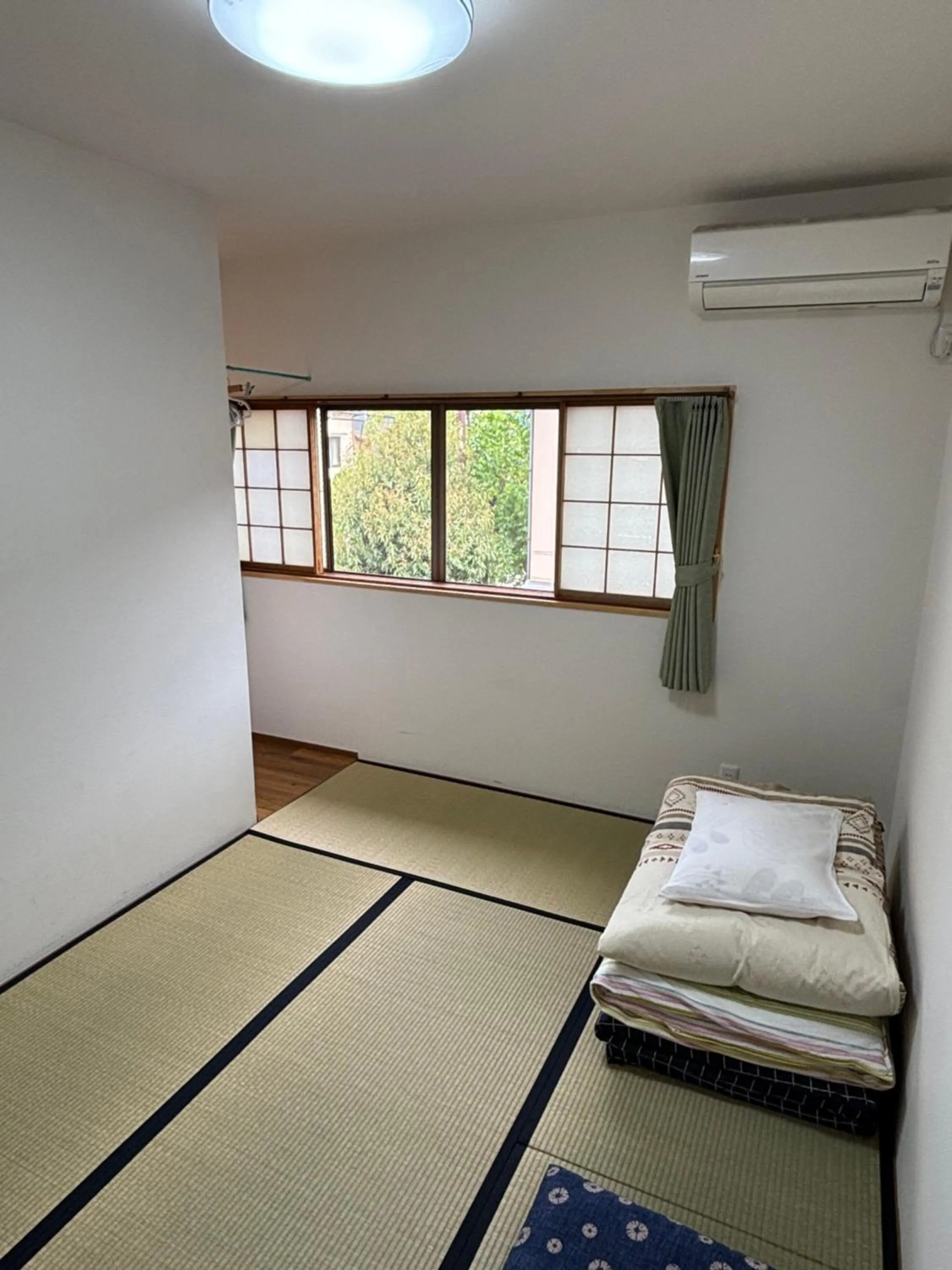 Bed in Kanazawa Guesthouse Stella