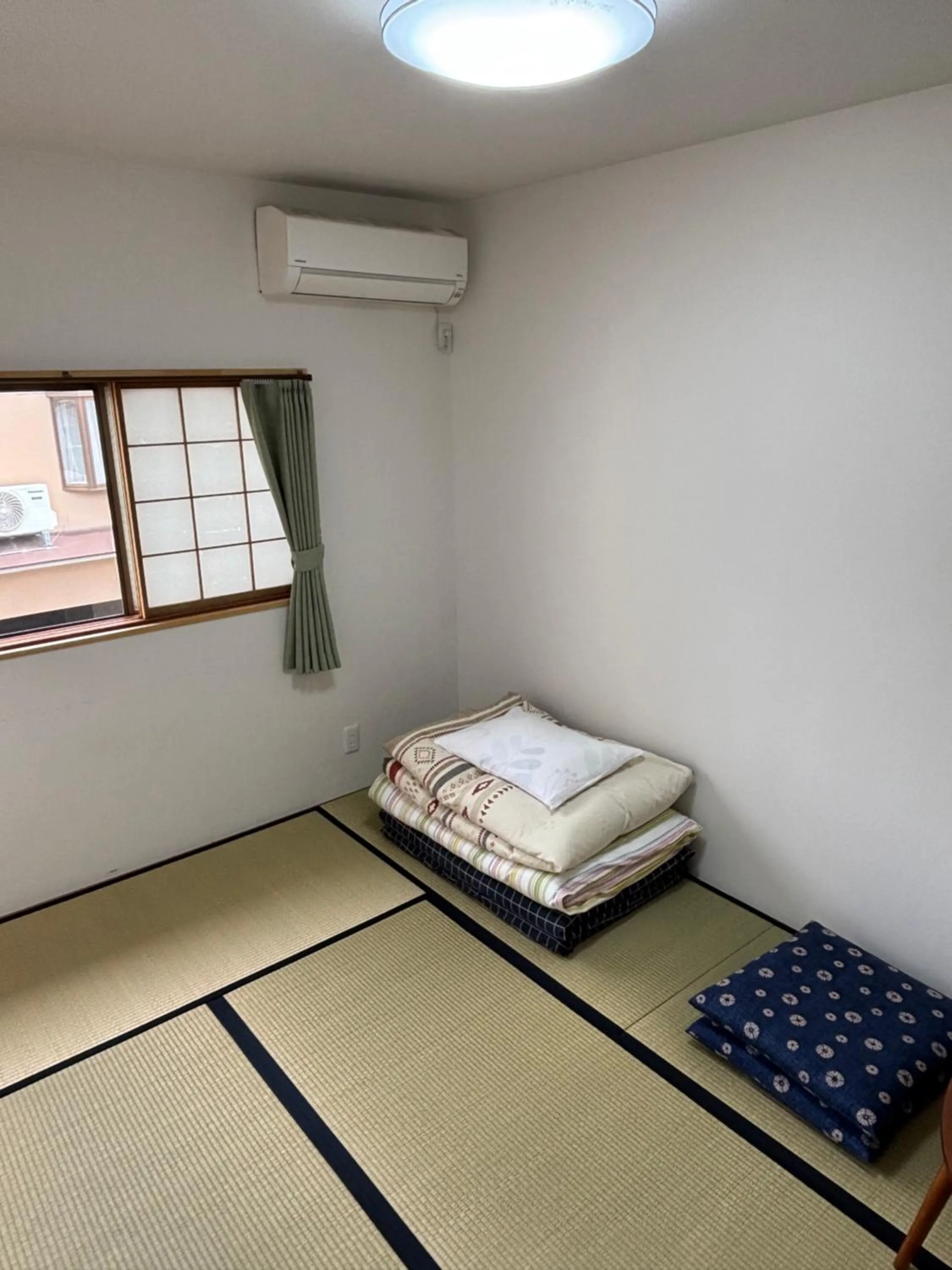 Bed in Kanazawa Guesthouse Stella