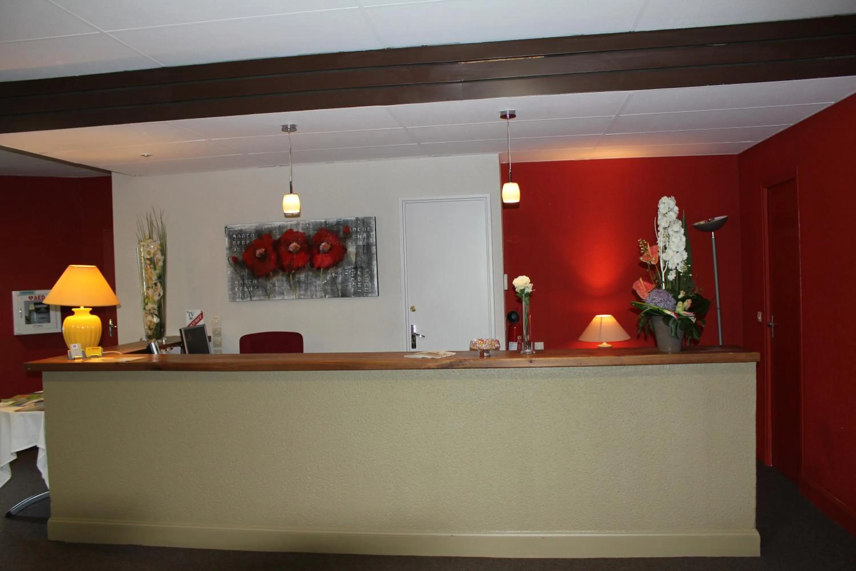 Lobby or reception in Cit'Hotel Les Alizés