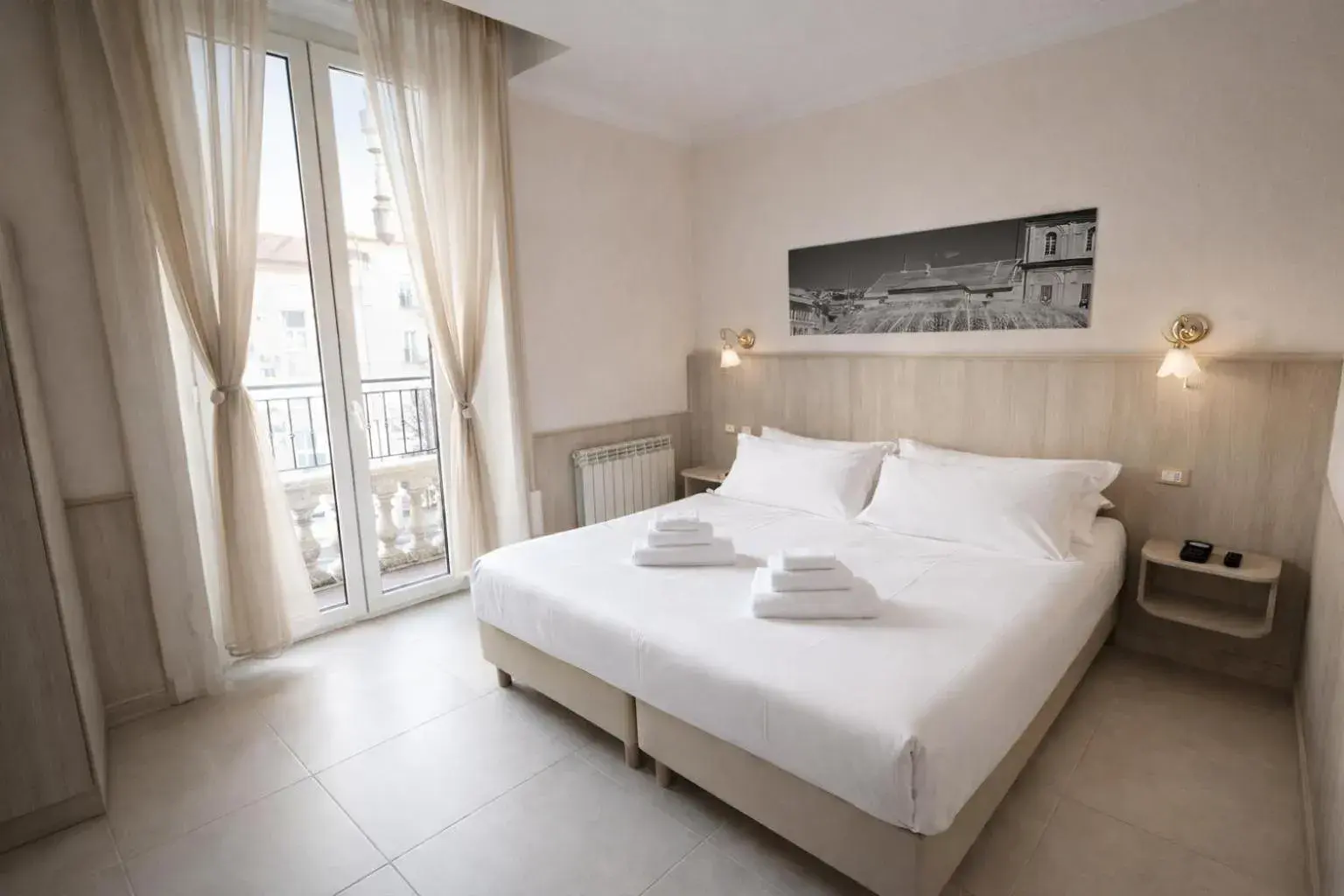 Bed in Hotel Cantore Bed in Hotel Cantore