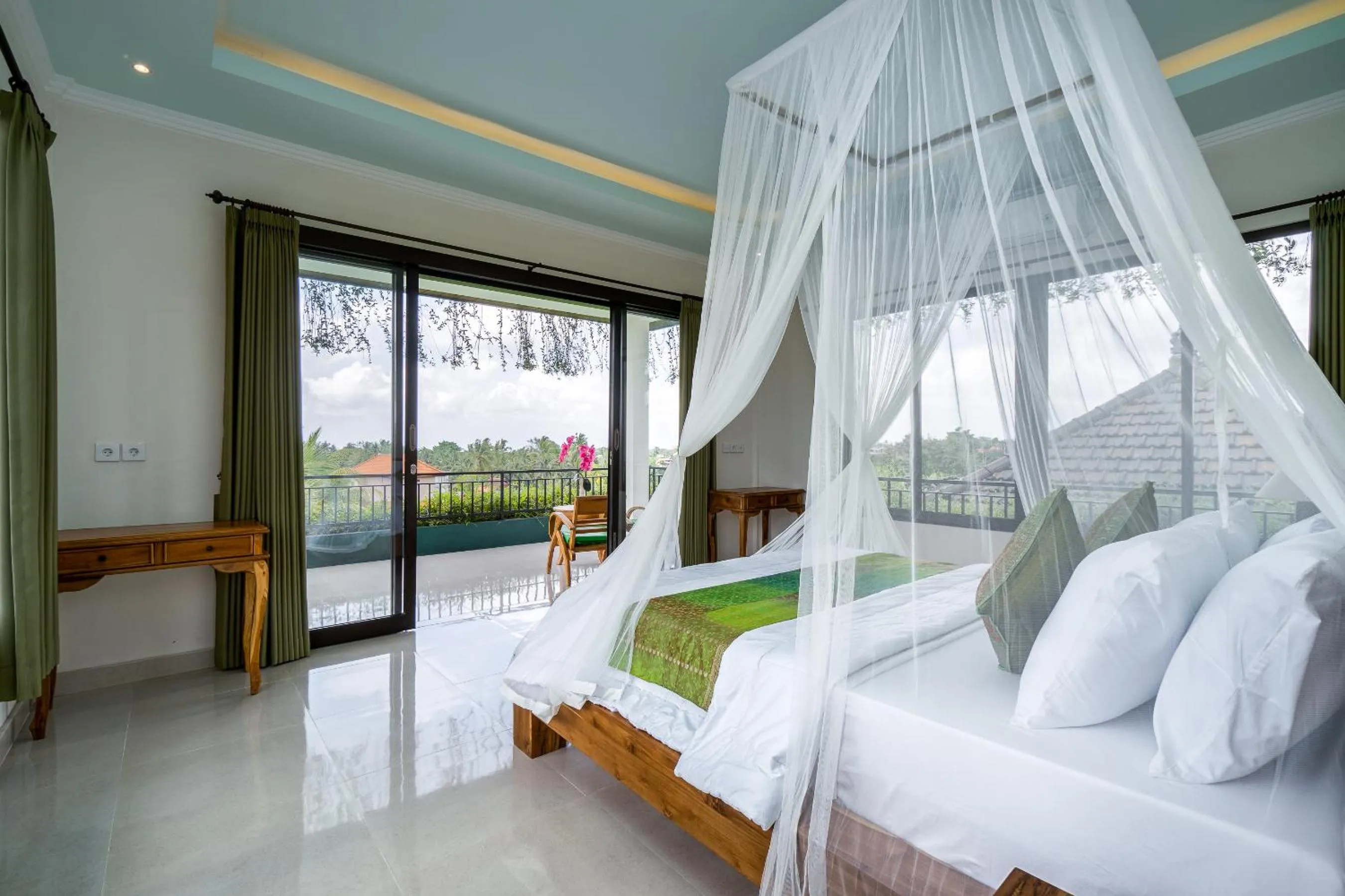 Bed in Cahaya Ubud Villa