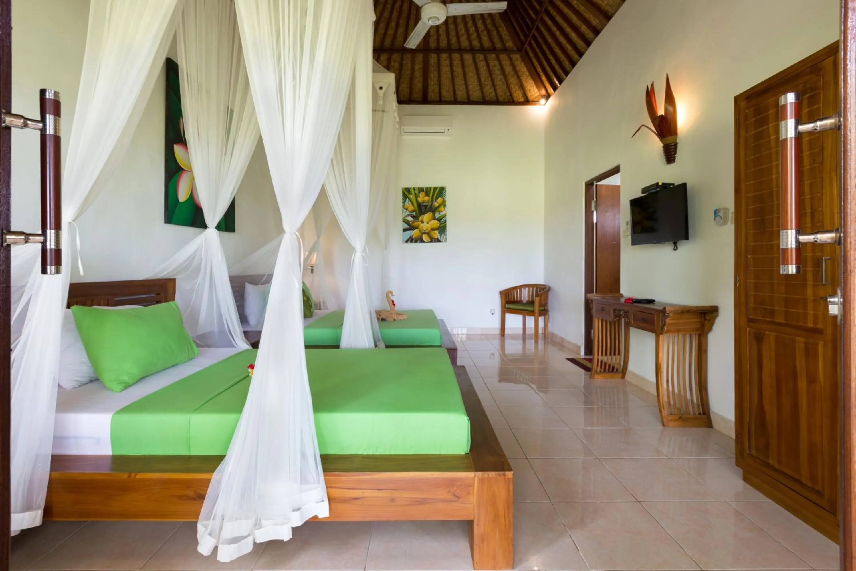 Bed in Cahaya Ubud Villa