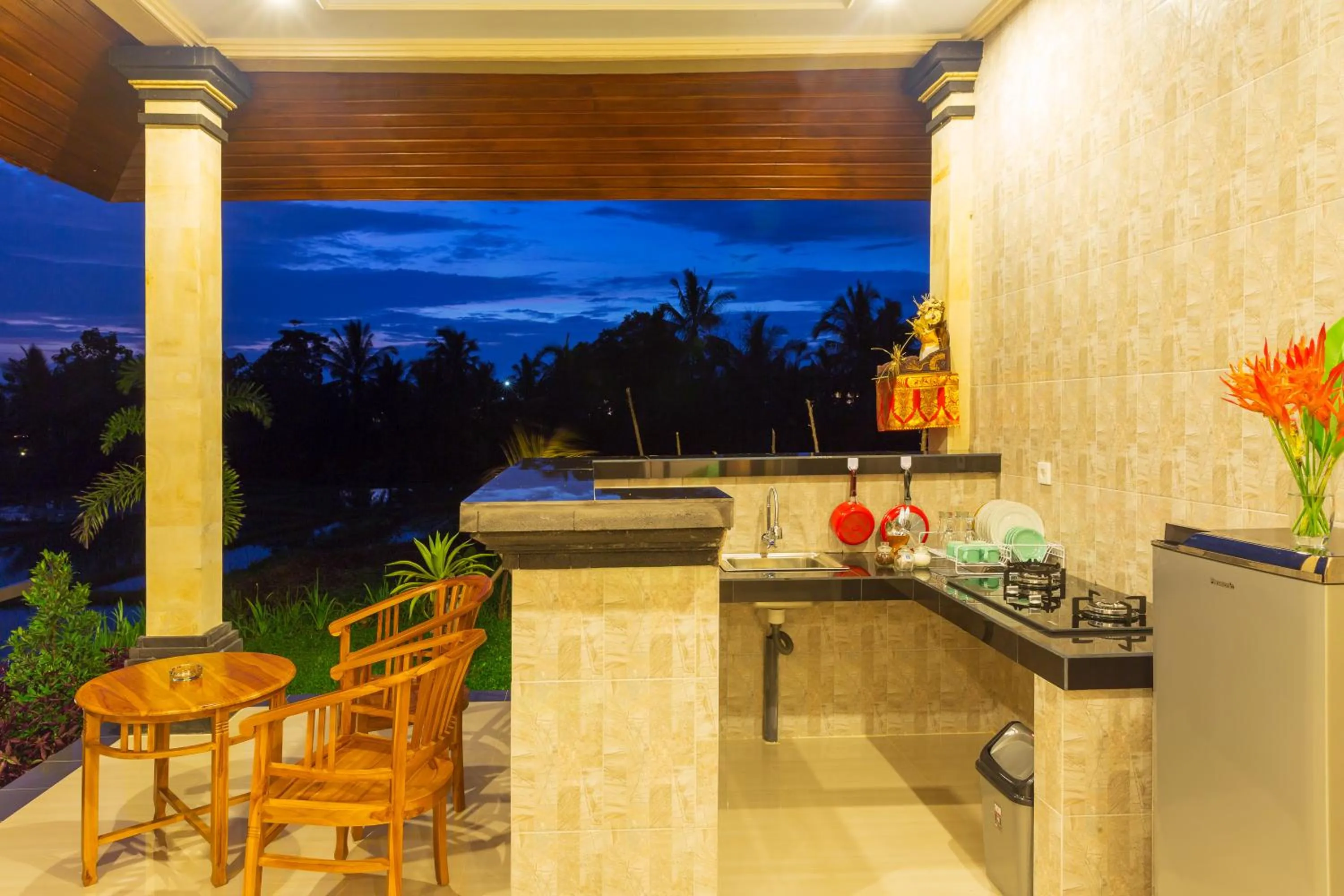 Kitchen or kitchenette in Cahaya Ubud Villa