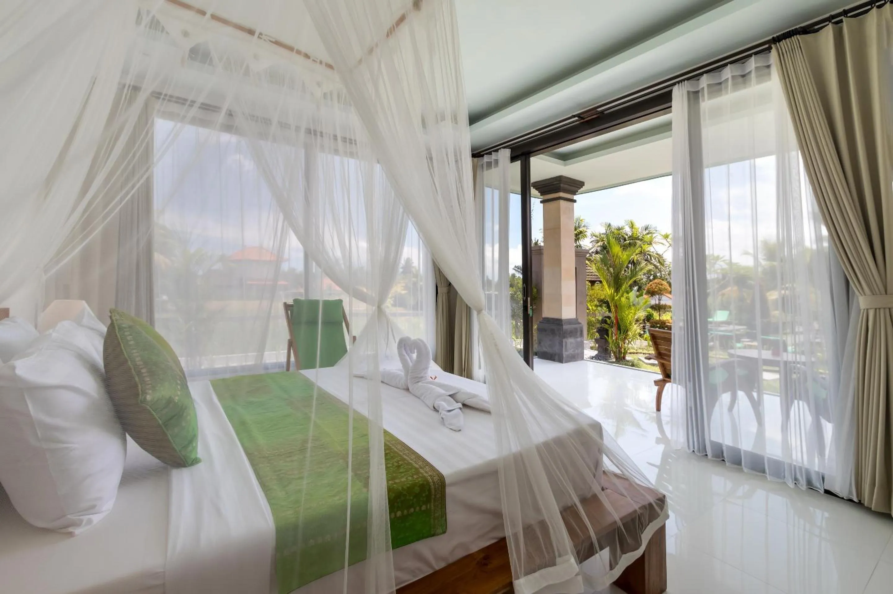 Bed in Cahaya Ubud Villa