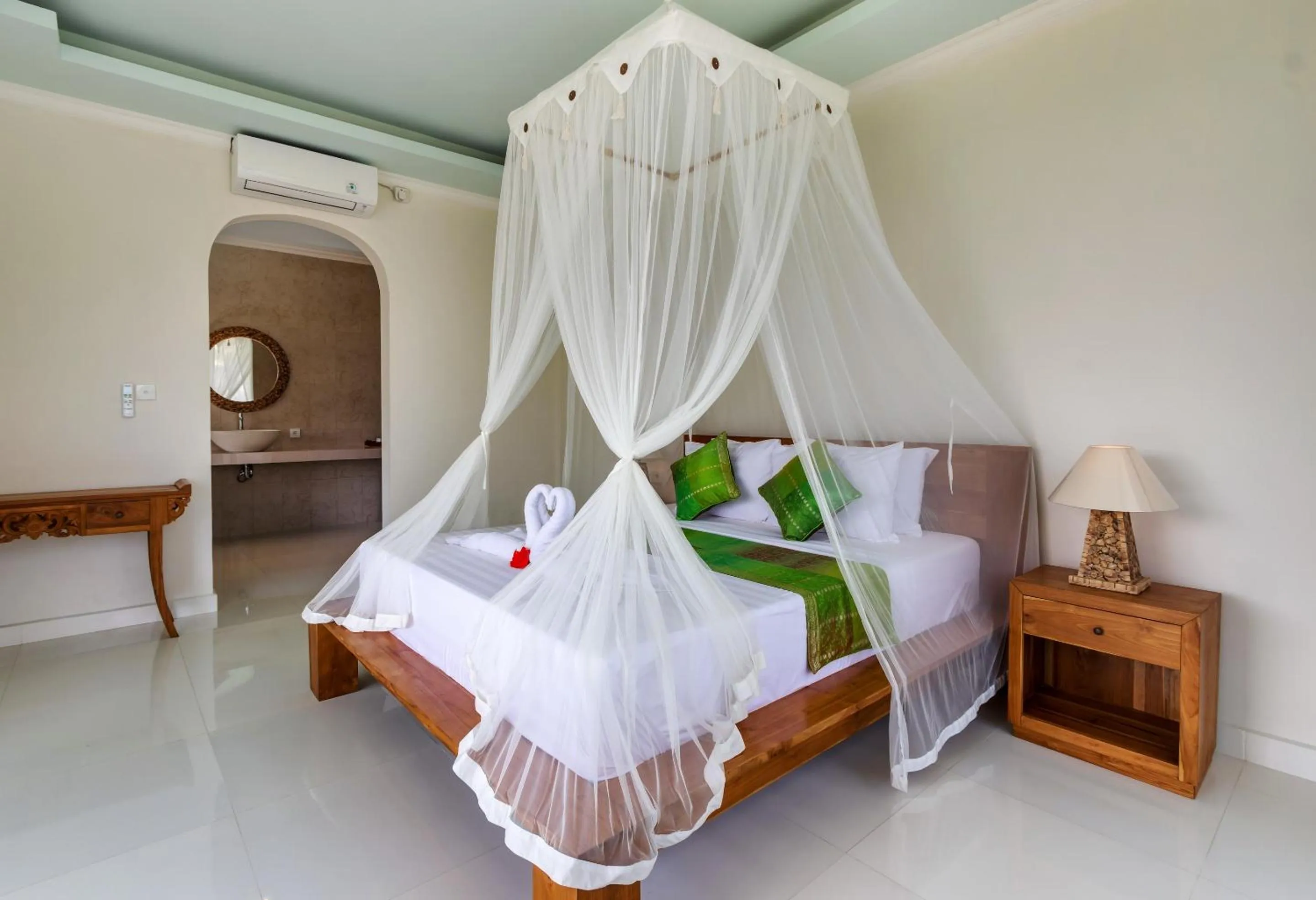 Bed in Cahaya Ubud Villa