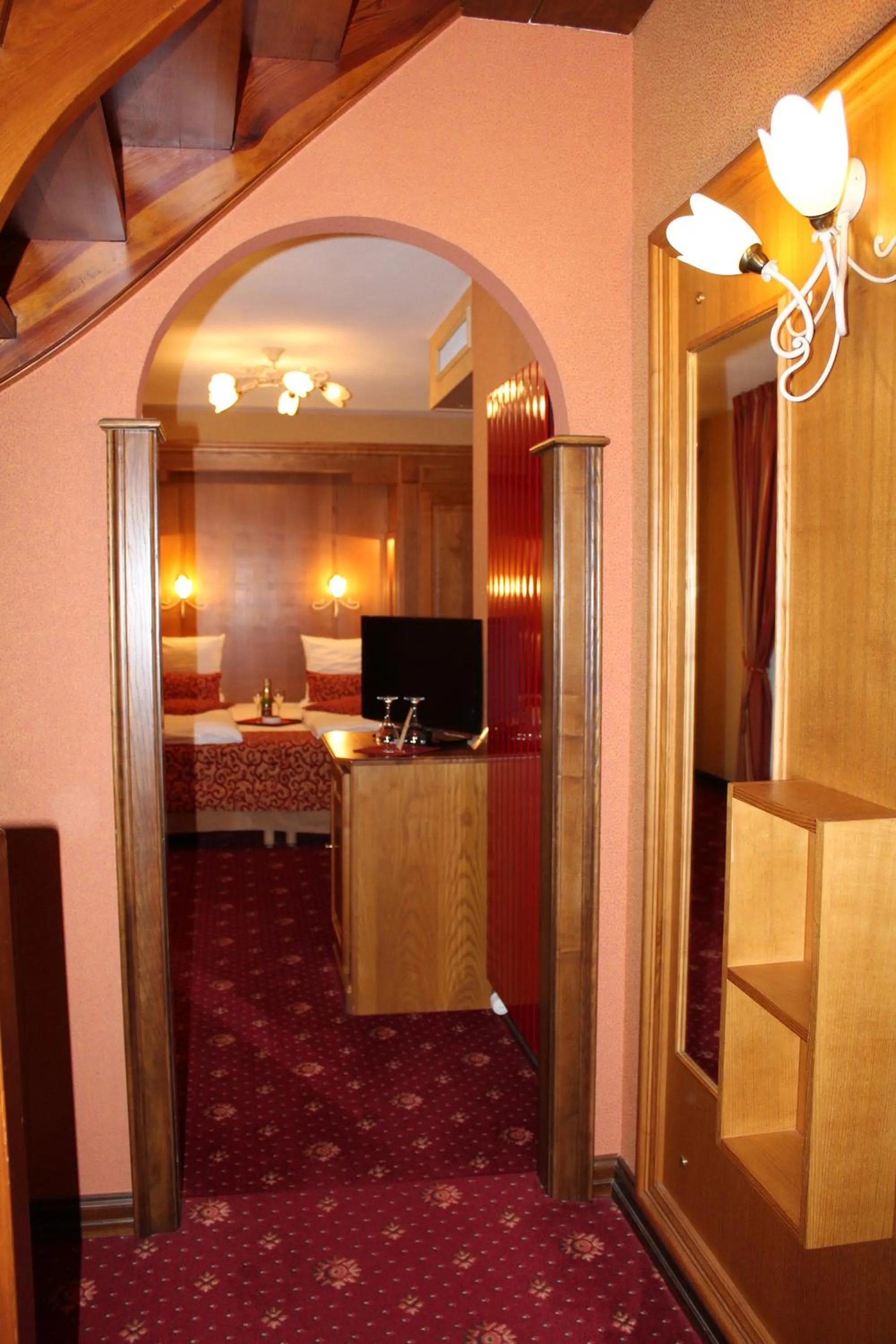 Bedroom in Hôtel Le Mittelwihr