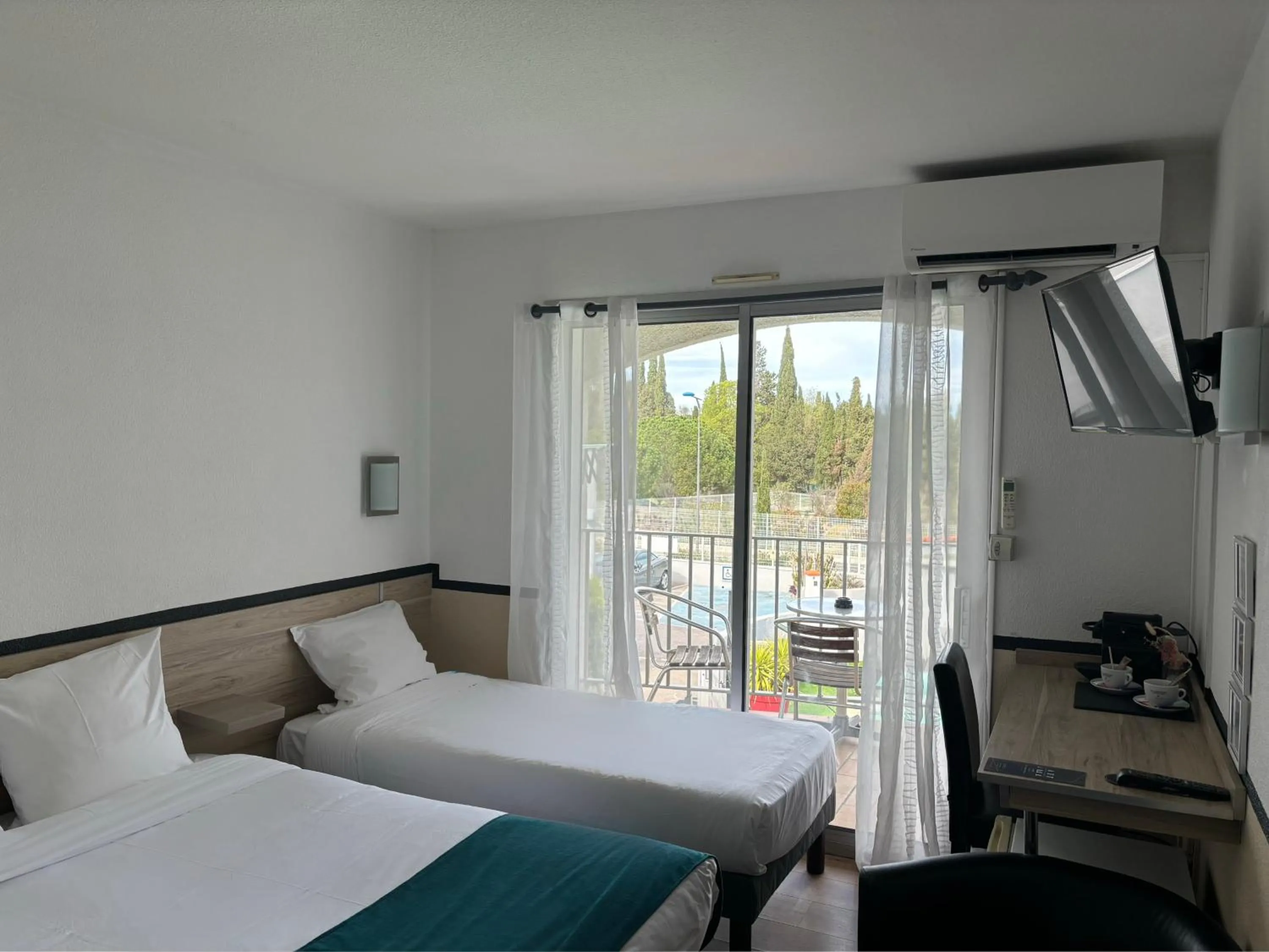 Bed in Acapella Hotel