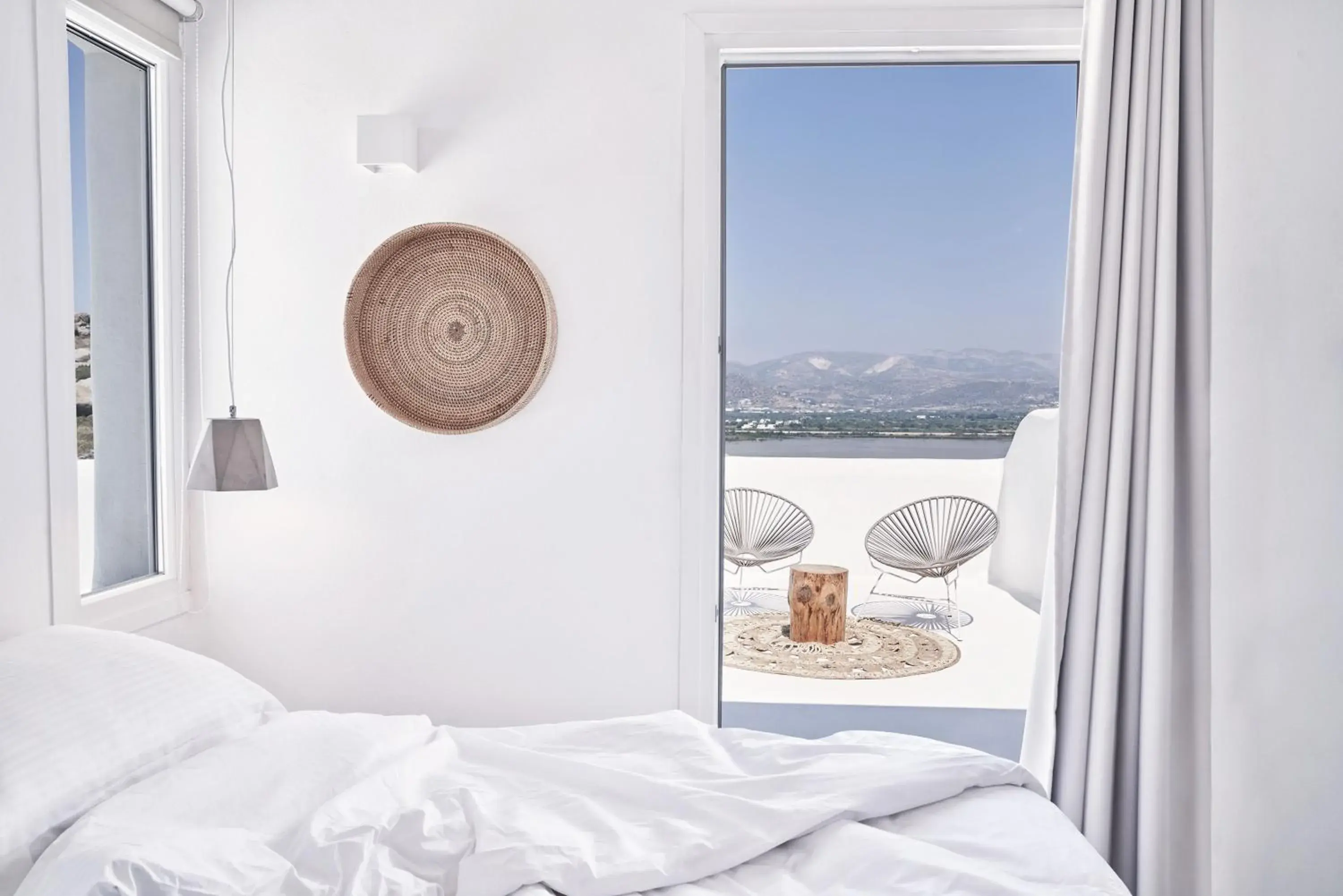 Bed in Naxian Utopia | Luxury Villas & Suites Bed in Naxian Utopia | Luxury Villas & Suites