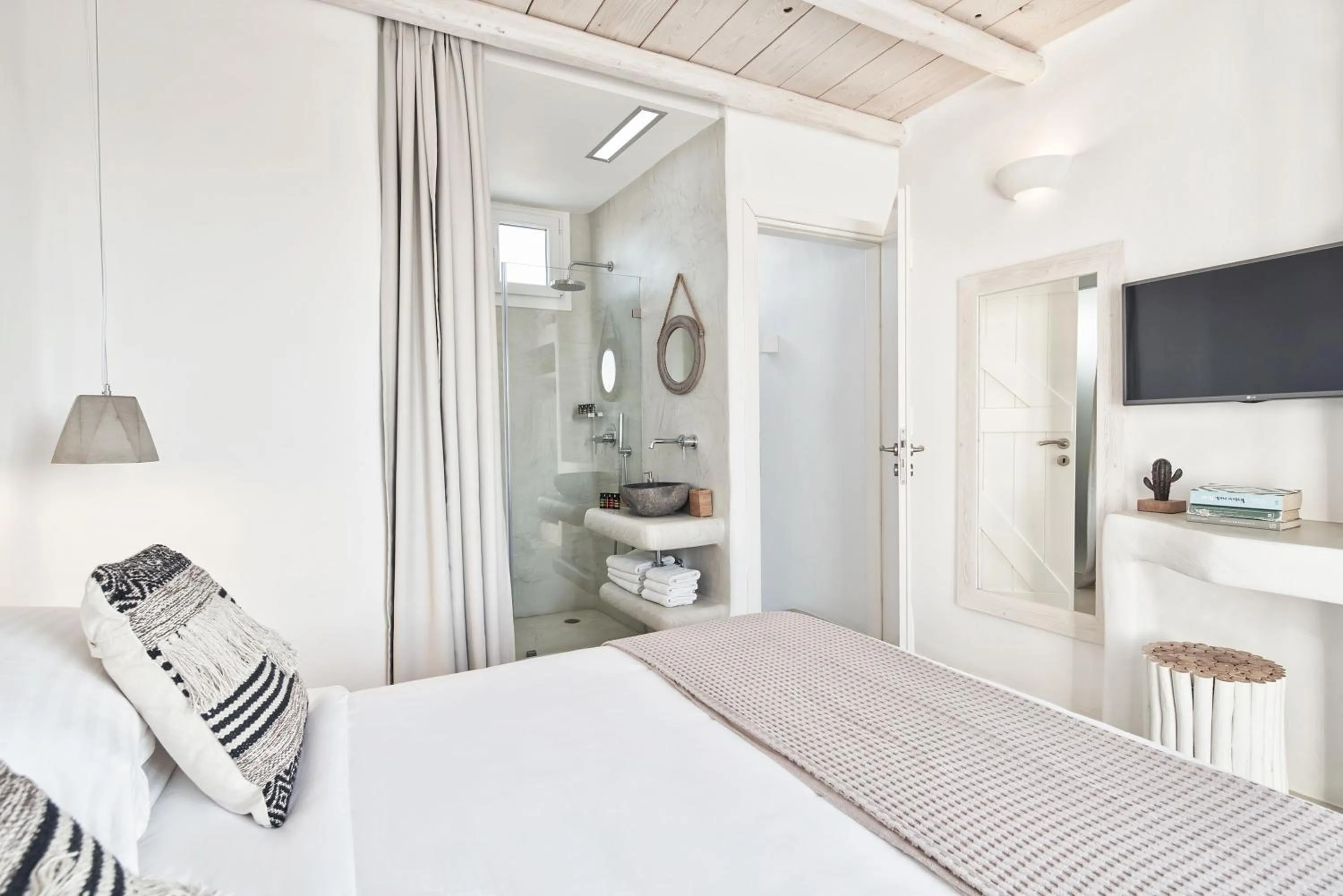 Bed in Naxian Utopia | Luxury Villas & Suites