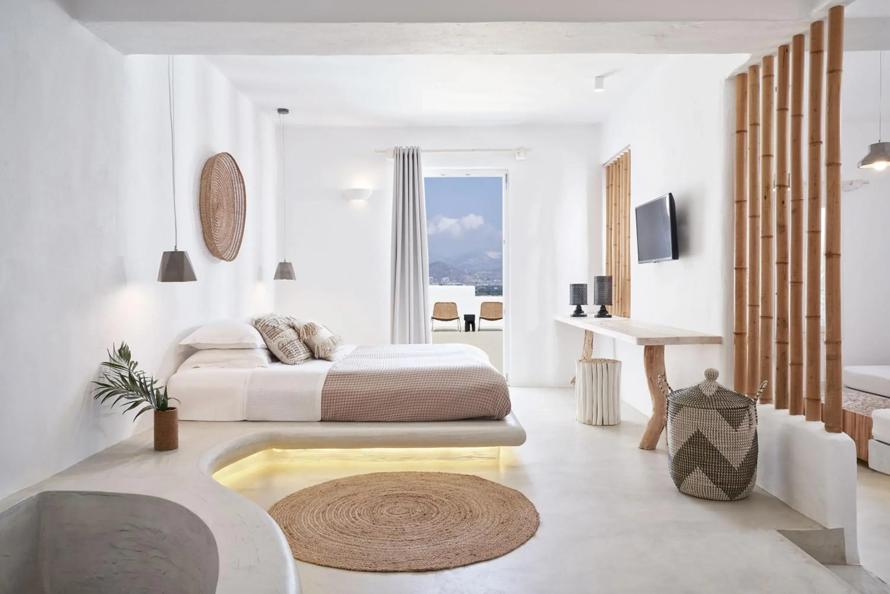 TV and multimedia, Bed in Naxian Utopia | Luxury Villas & Suites TV and multimedia, Bed in Naxian Utopia | Luxury Villas & Suites