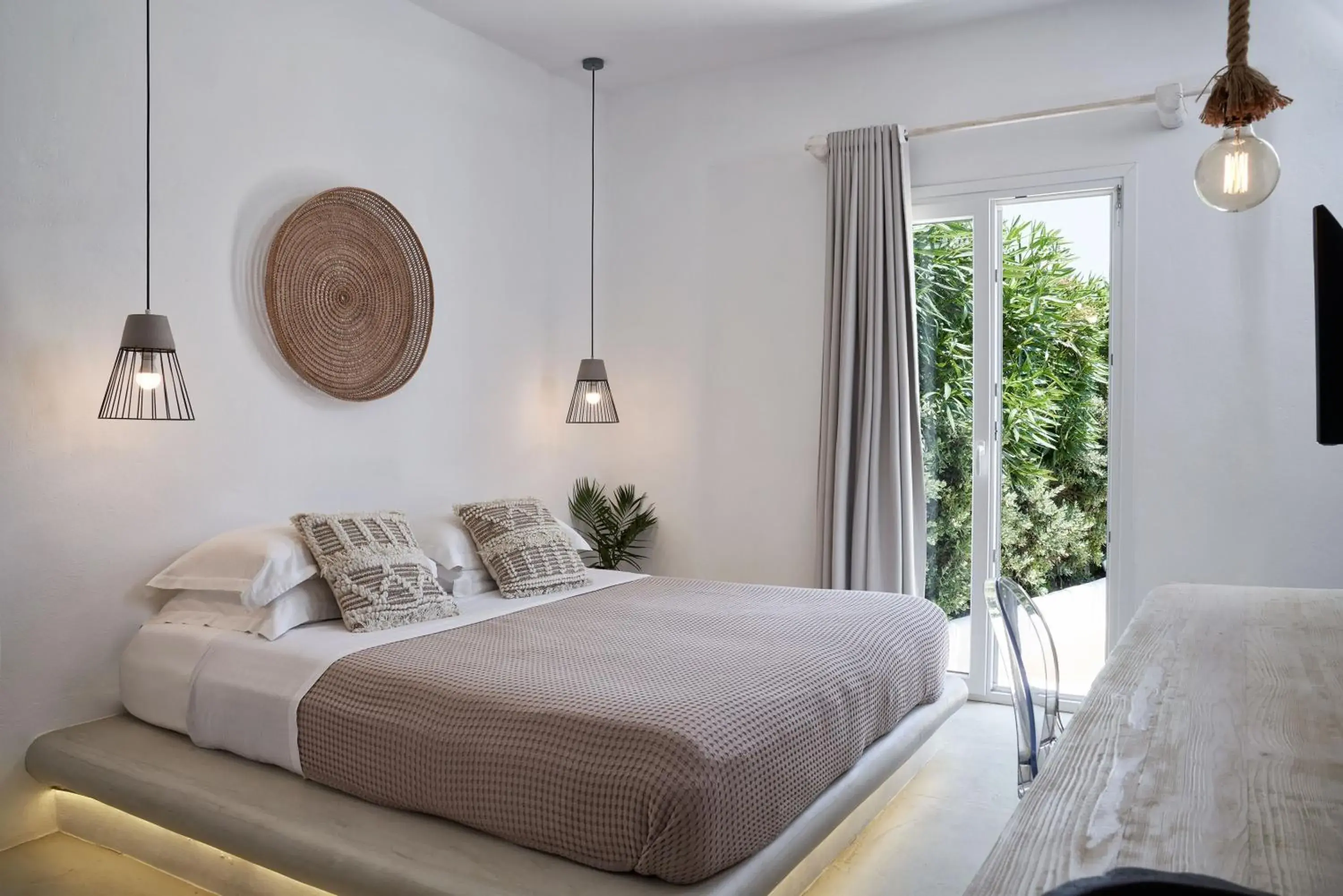 Bed in Naxian Utopia | Luxury Villas & Suites Bed in Naxian Utopia | Luxury Villas & Suites
