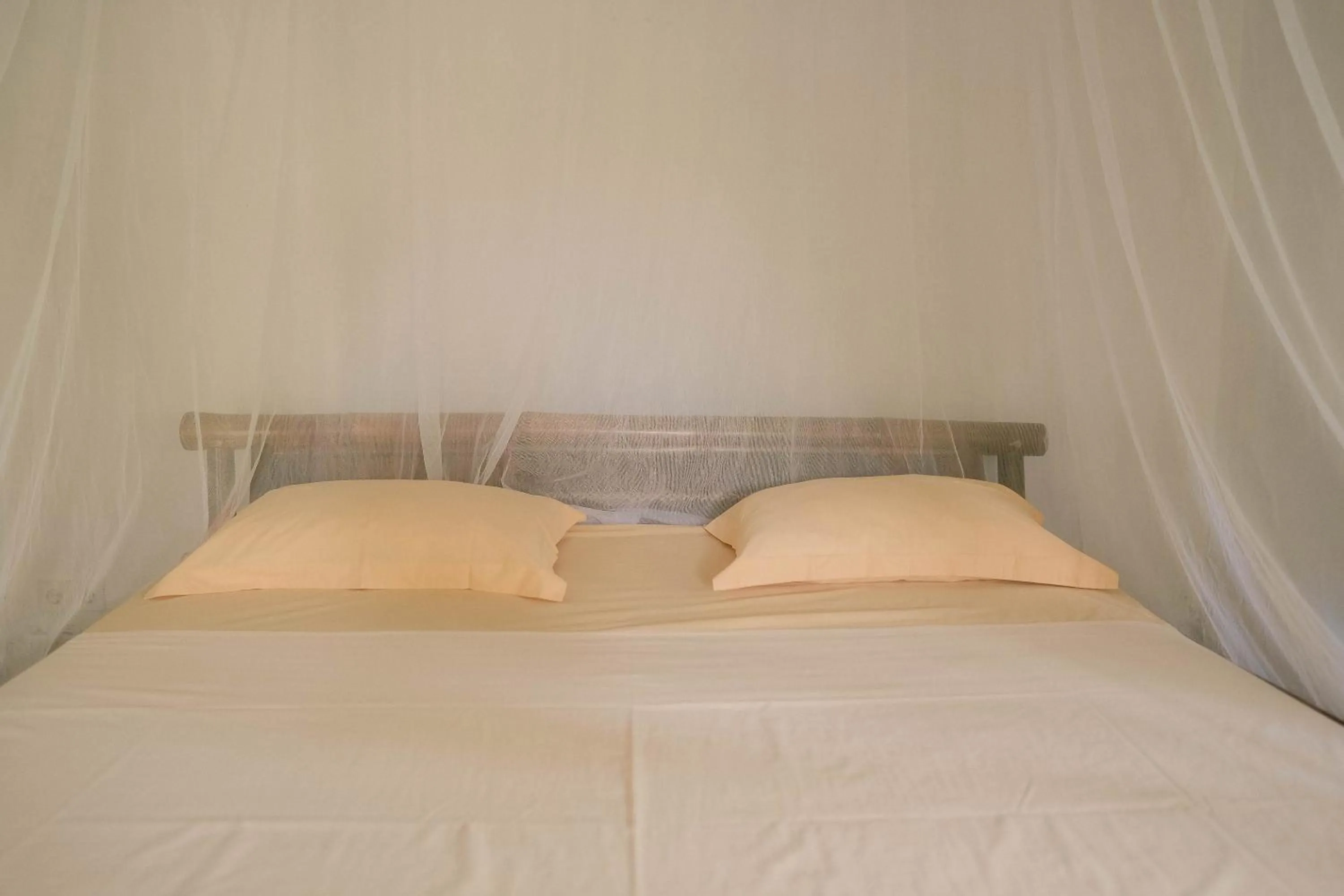 Bed in Ecolodge Bukit Lawang