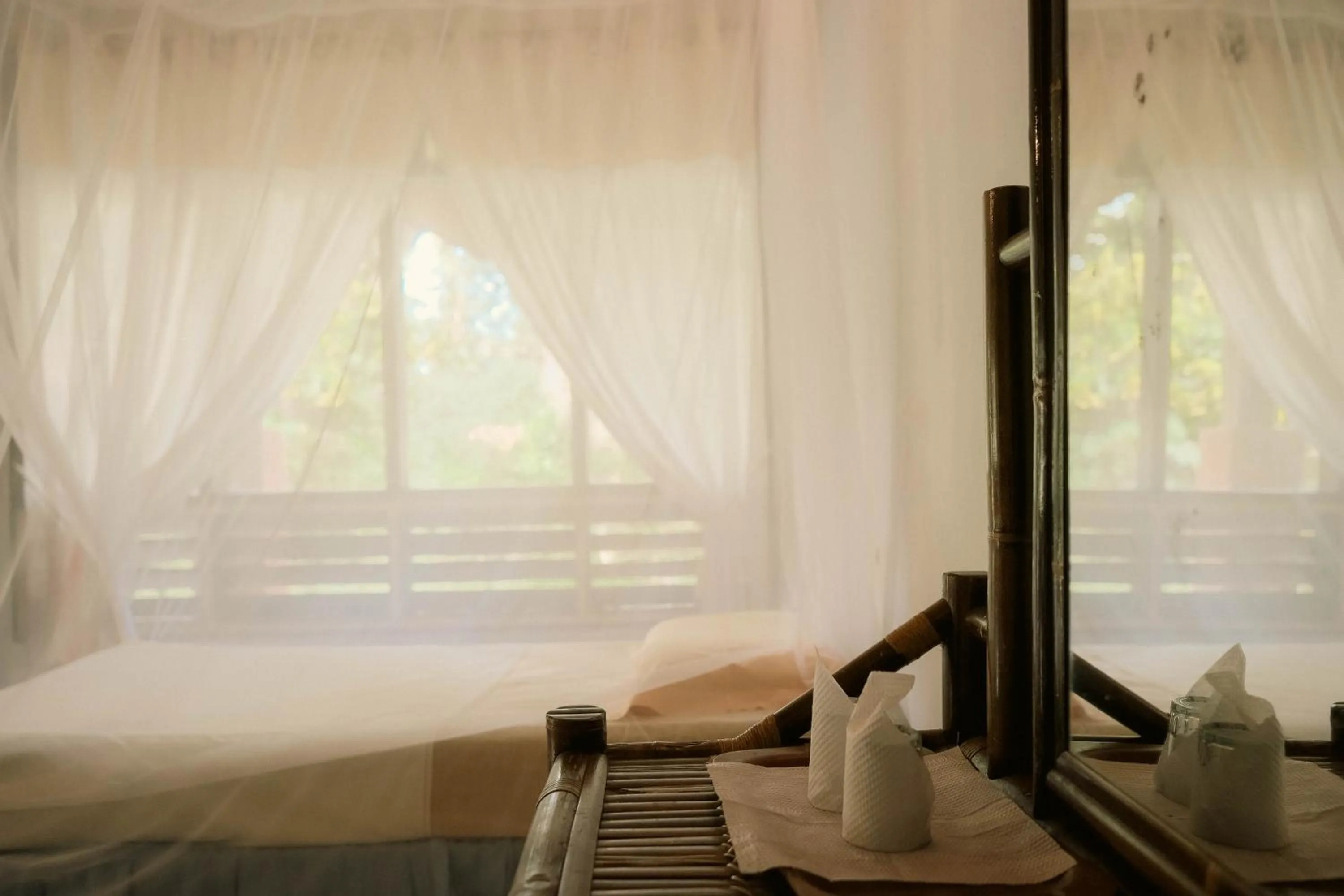 Bed in Ecolodge Bukit Lawang