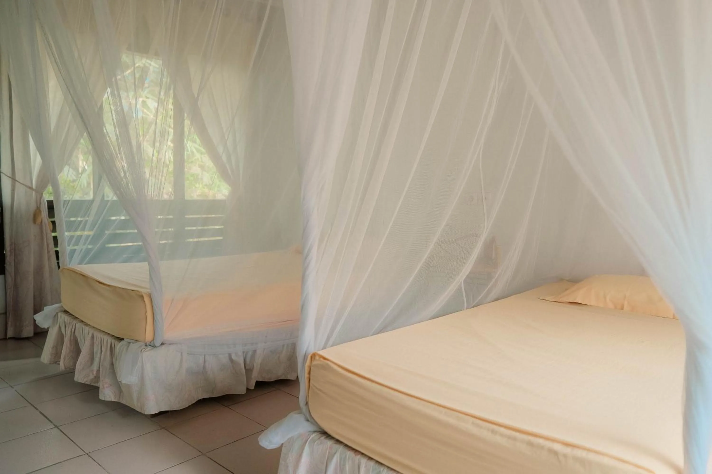 Bed in Ecolodge Bukit Lawang