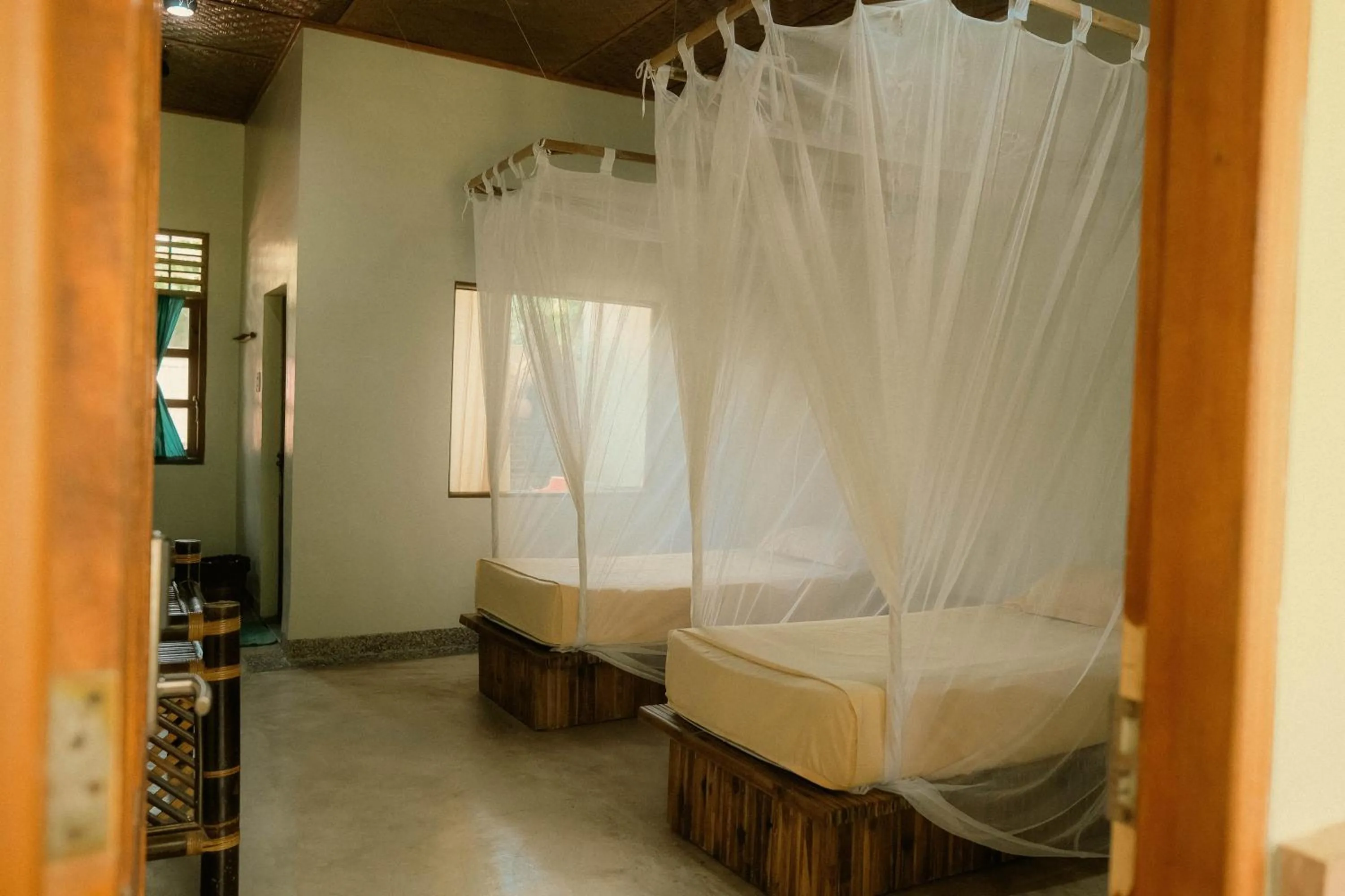 Bed in Ecolodge Bukit Lawang