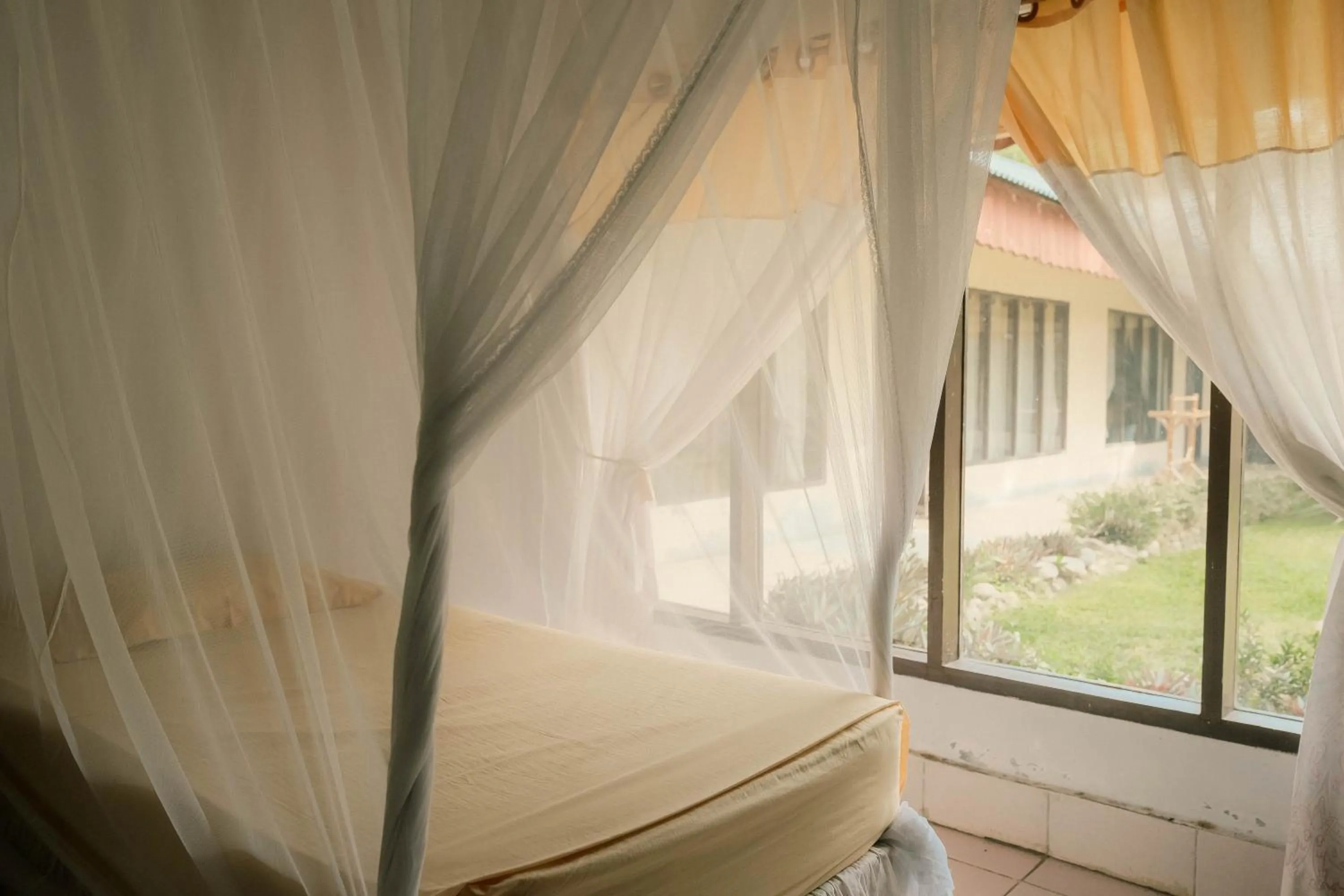 Bed in Ecolodge Bukit Lawang