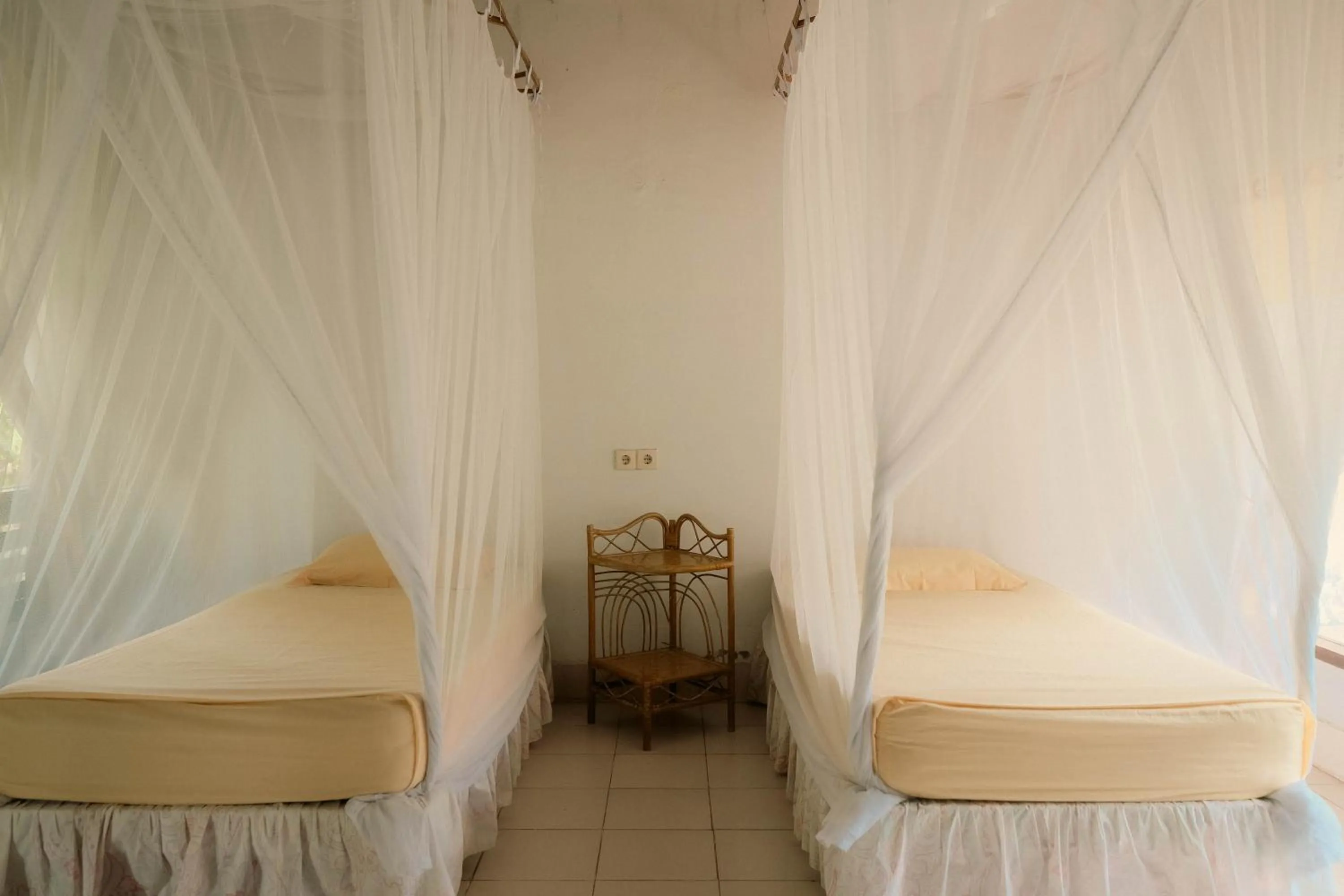 Bed in Ecolodge Bukit Lawang