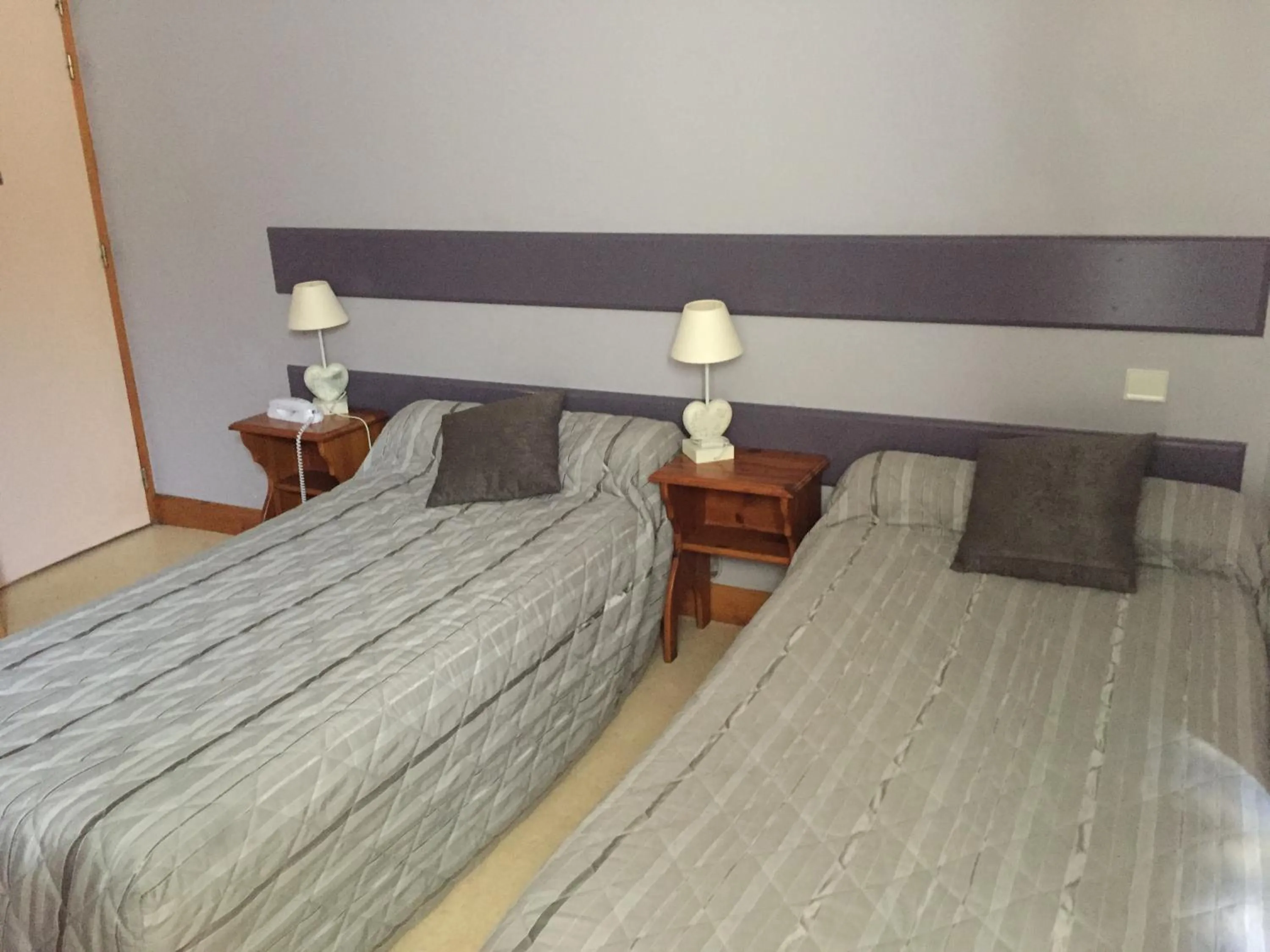 Bed in Hotel Le Centre