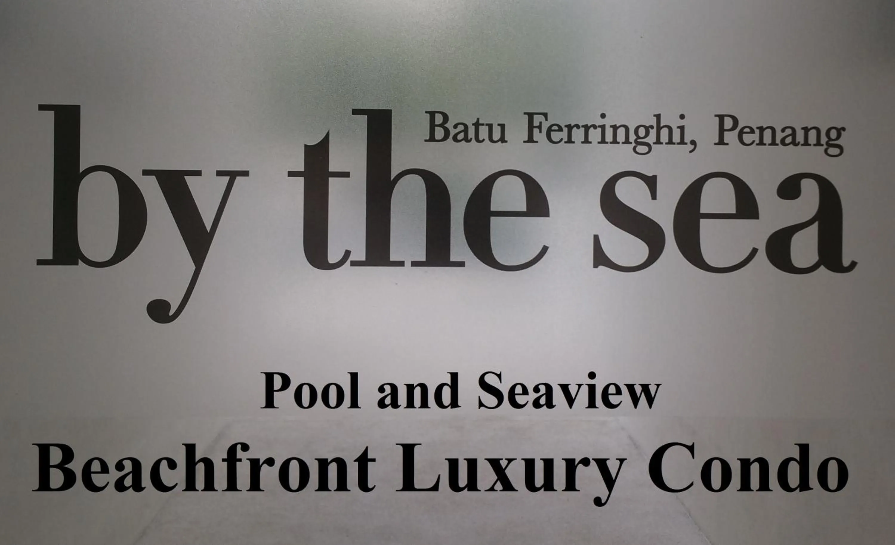 Text overlay in By the Sea- Pool and Sea View