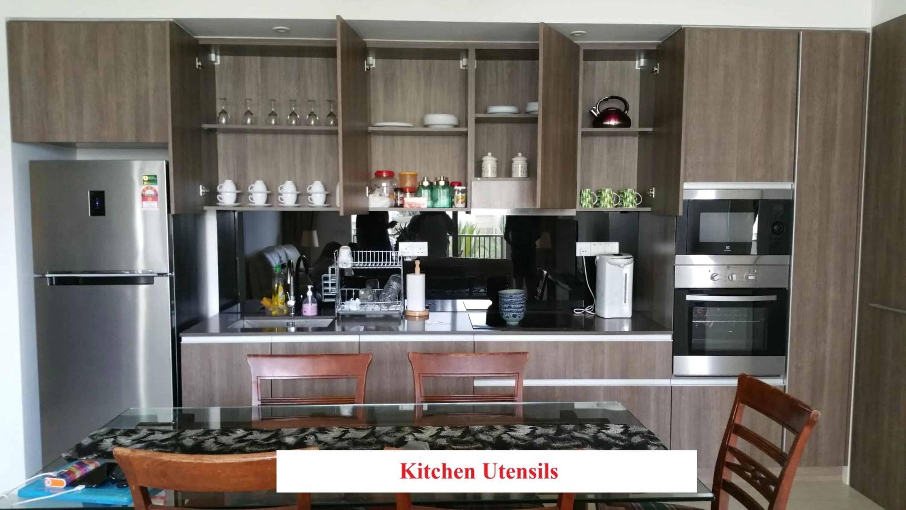 Kitchen or kitchenette in By the Sea- Pool and Sea View