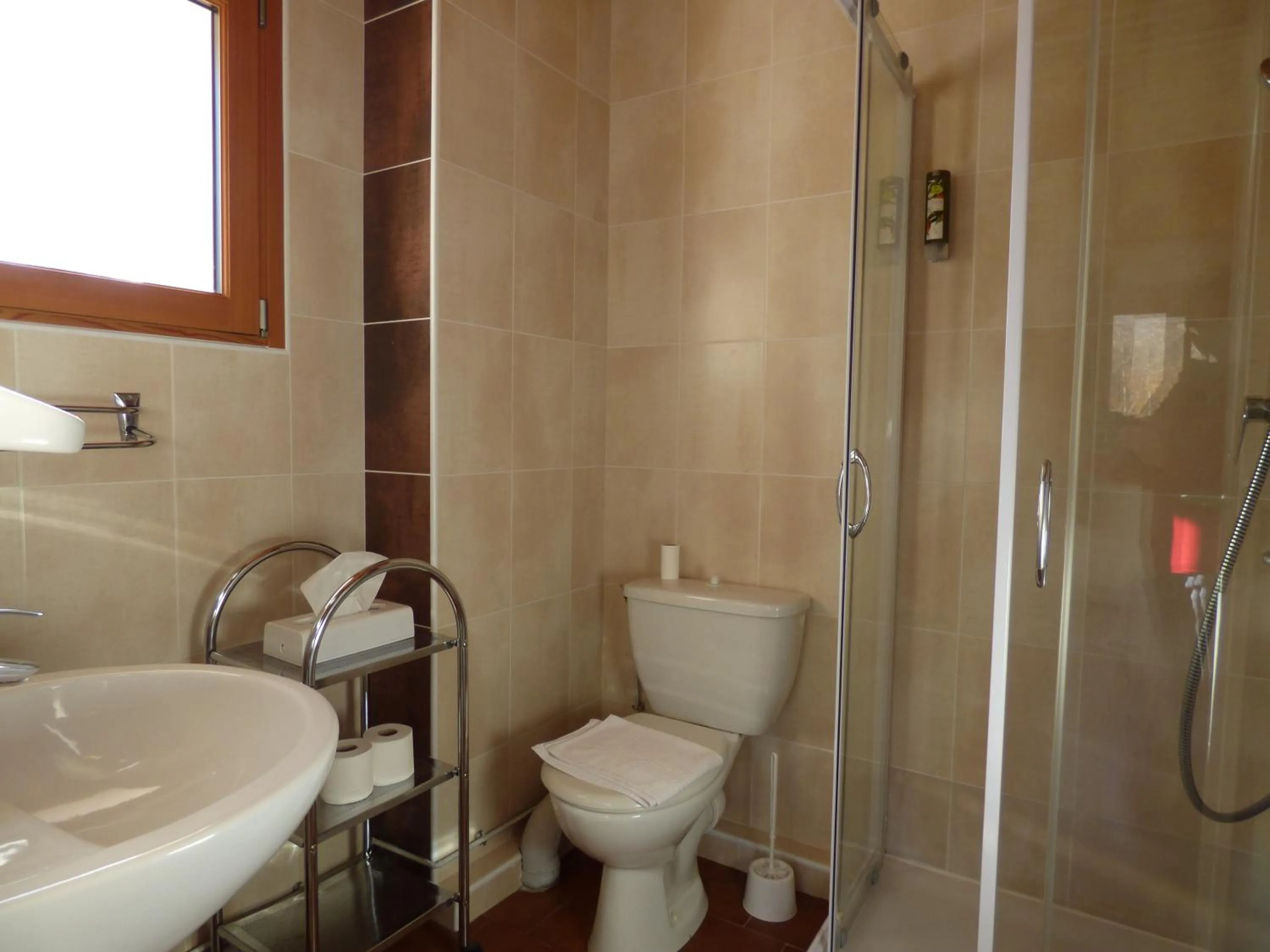 Bathroom in Logis Hôtels La Crémaillère