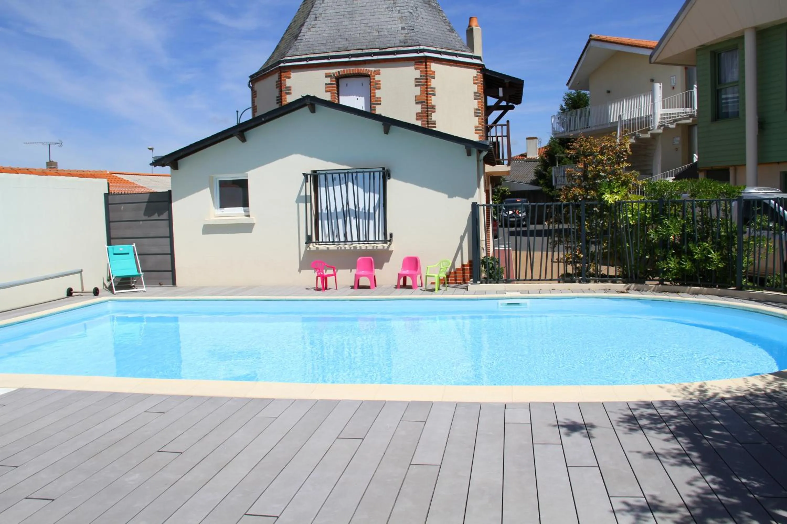 Swimming pool in Logis Hotel Restaurant Le Grand Turc
