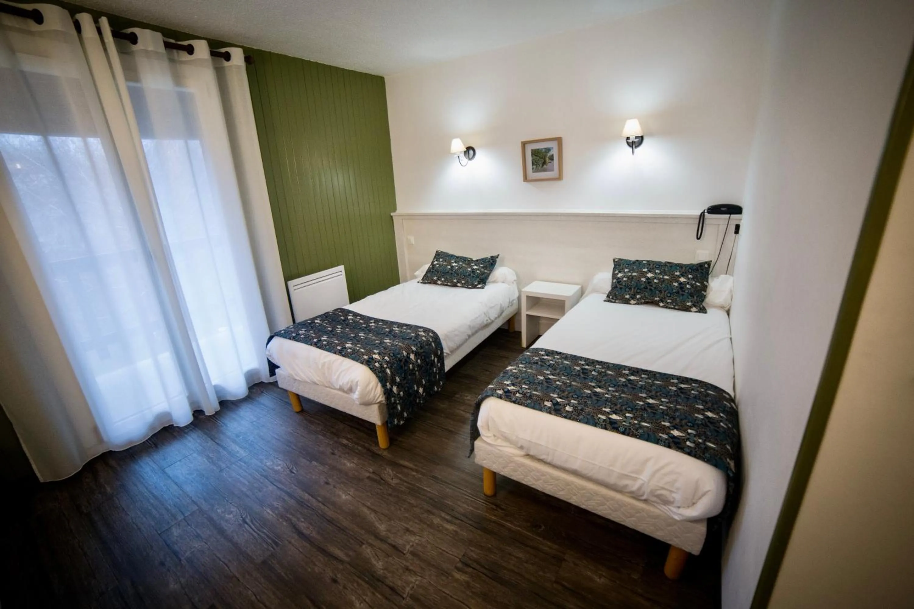 Bed in Le Catinat Fleuri