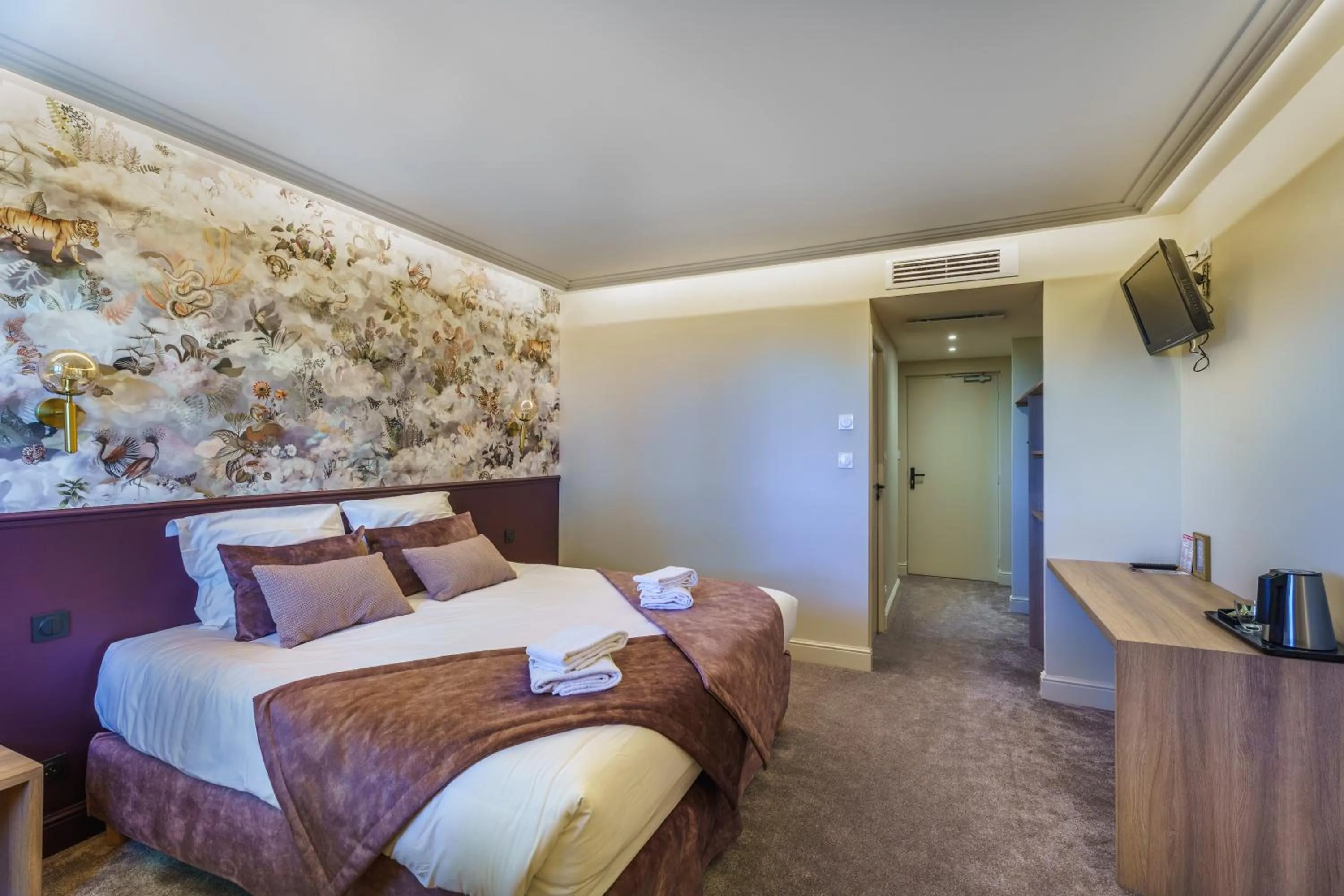 Bed in Hôtel Le Clos des Arts