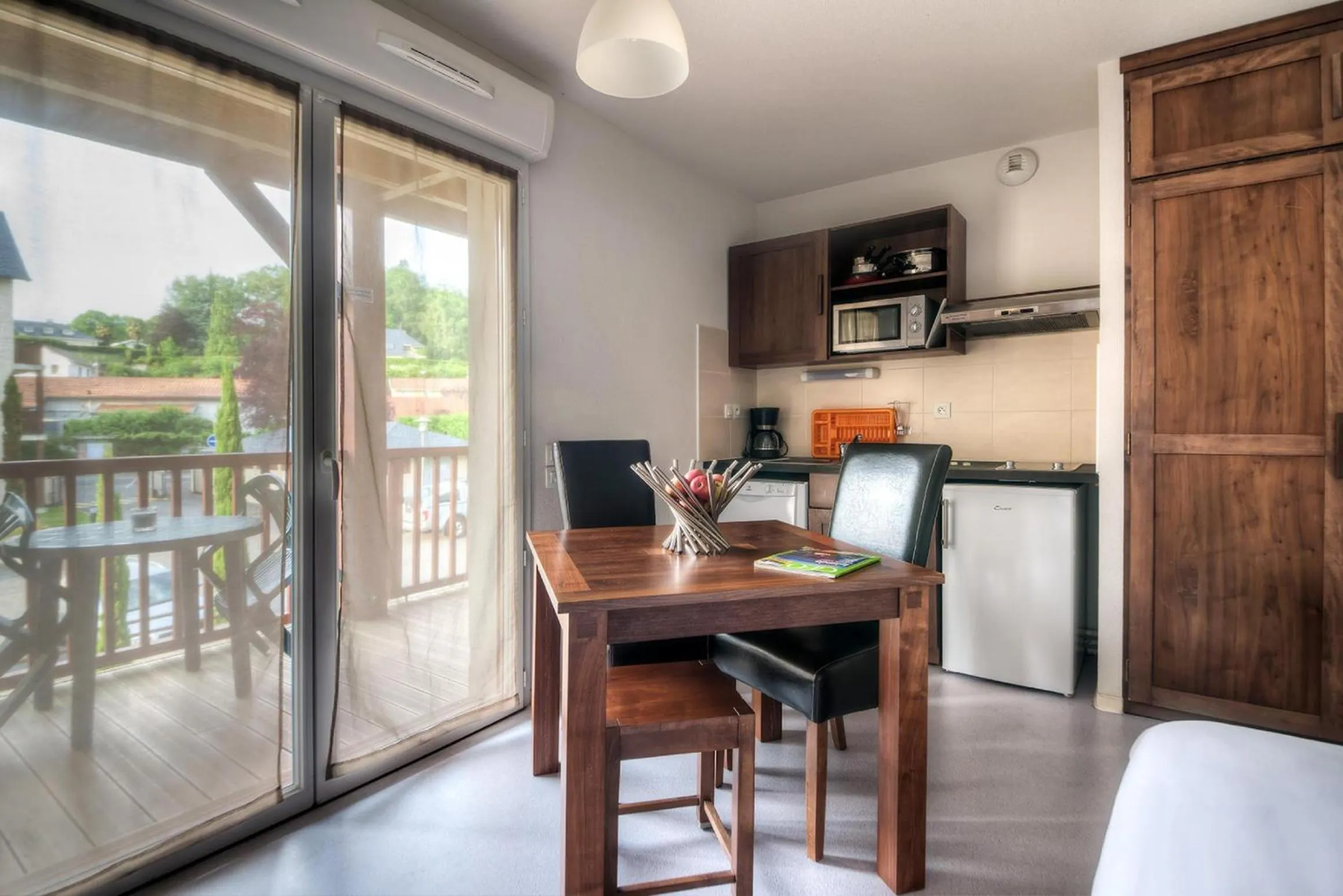 Photo of the whole room in Comfort Aparthotel Lourdes L'Acacia