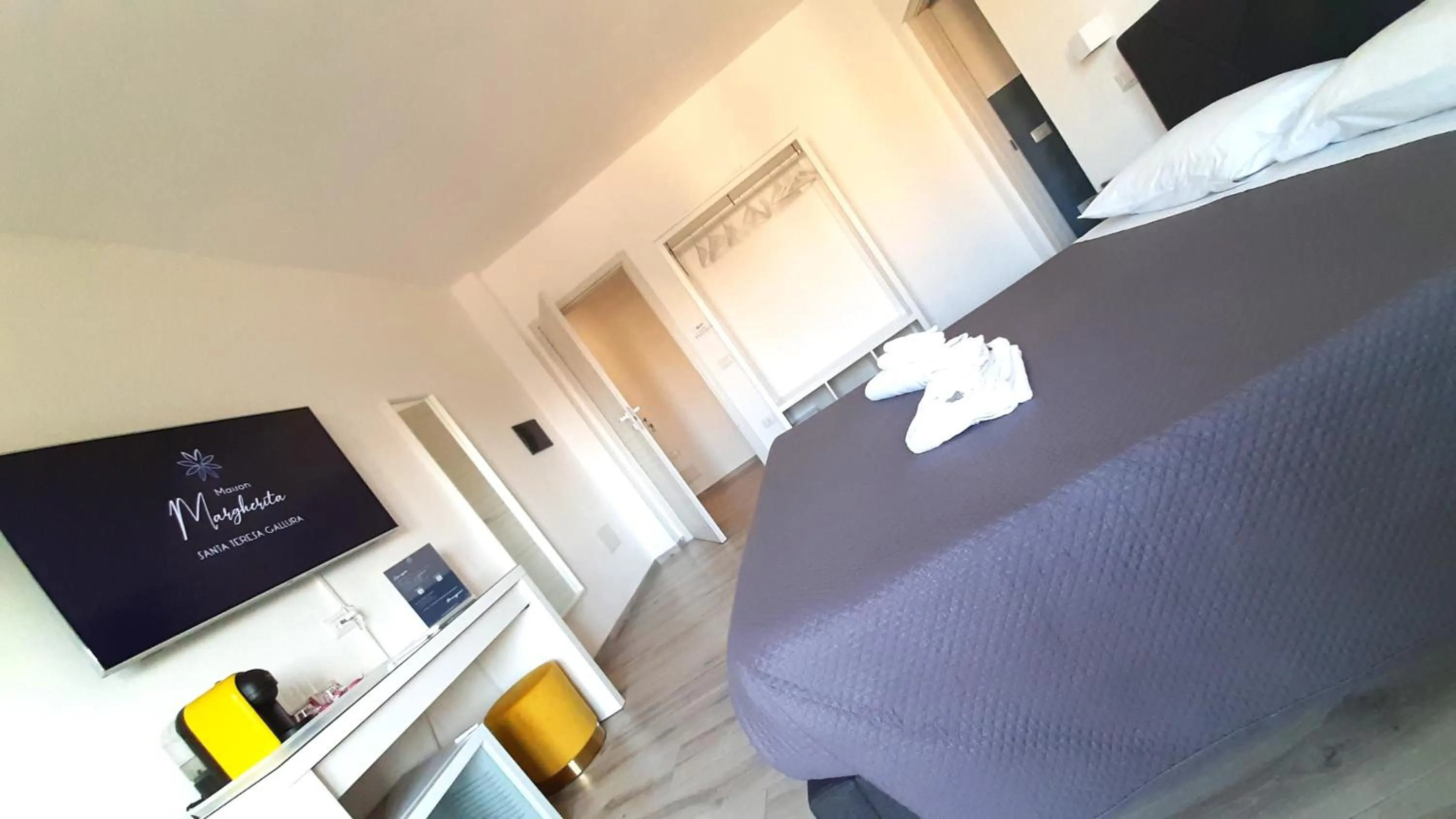 TV and multimedia, Bed in Maison Margherita