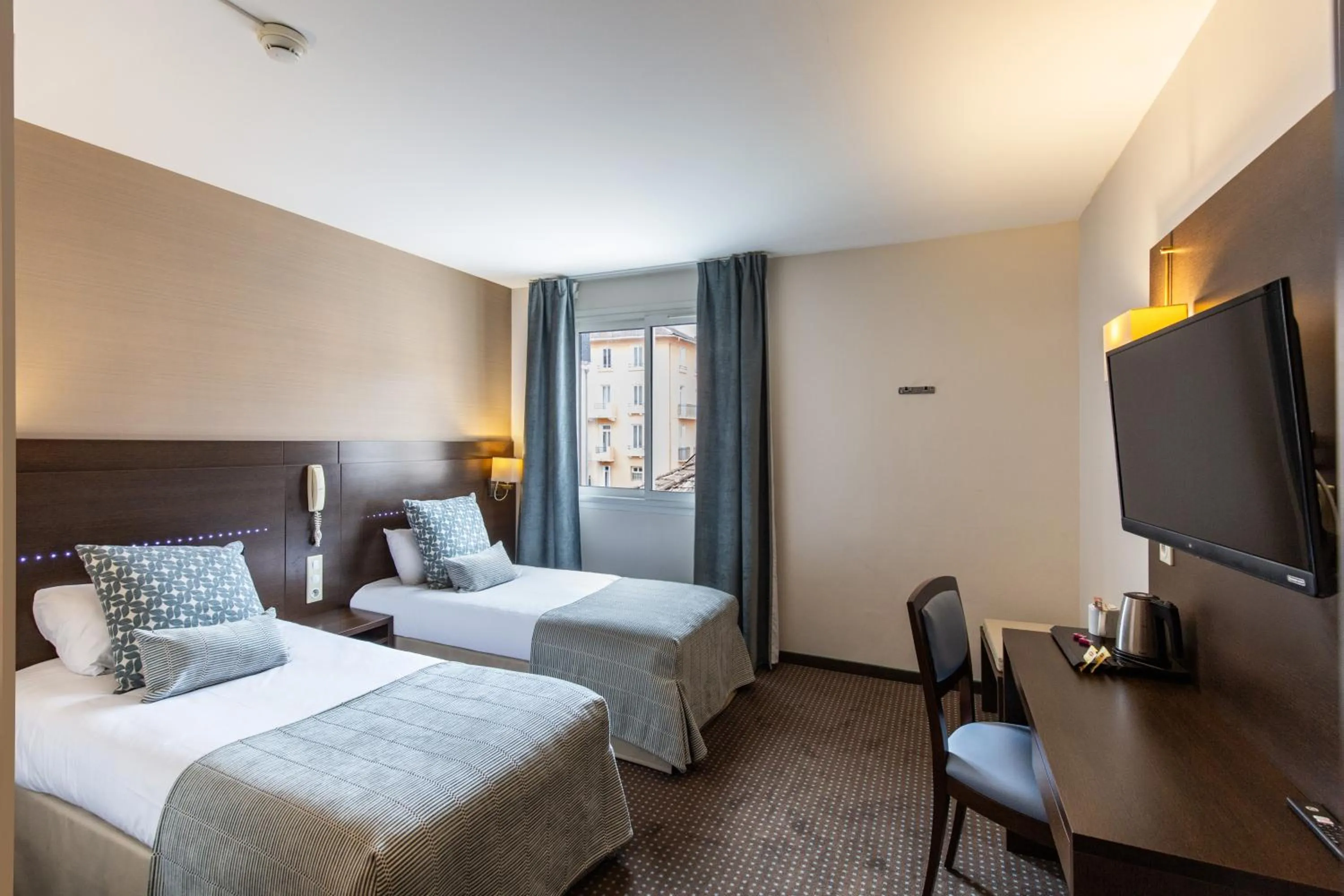 Bed in Helgon Hotel - Lourdes Pyrénées