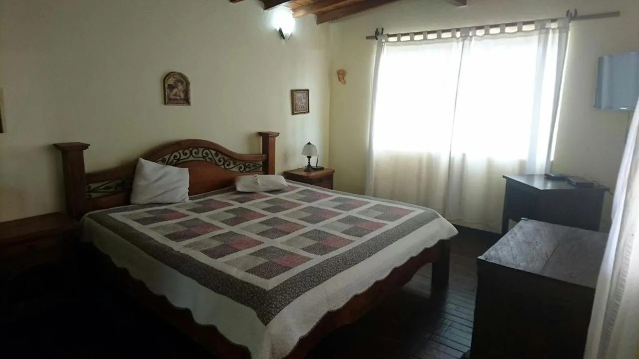 Photo of the whole room, Bed in Finca Hotel La Ponderosa