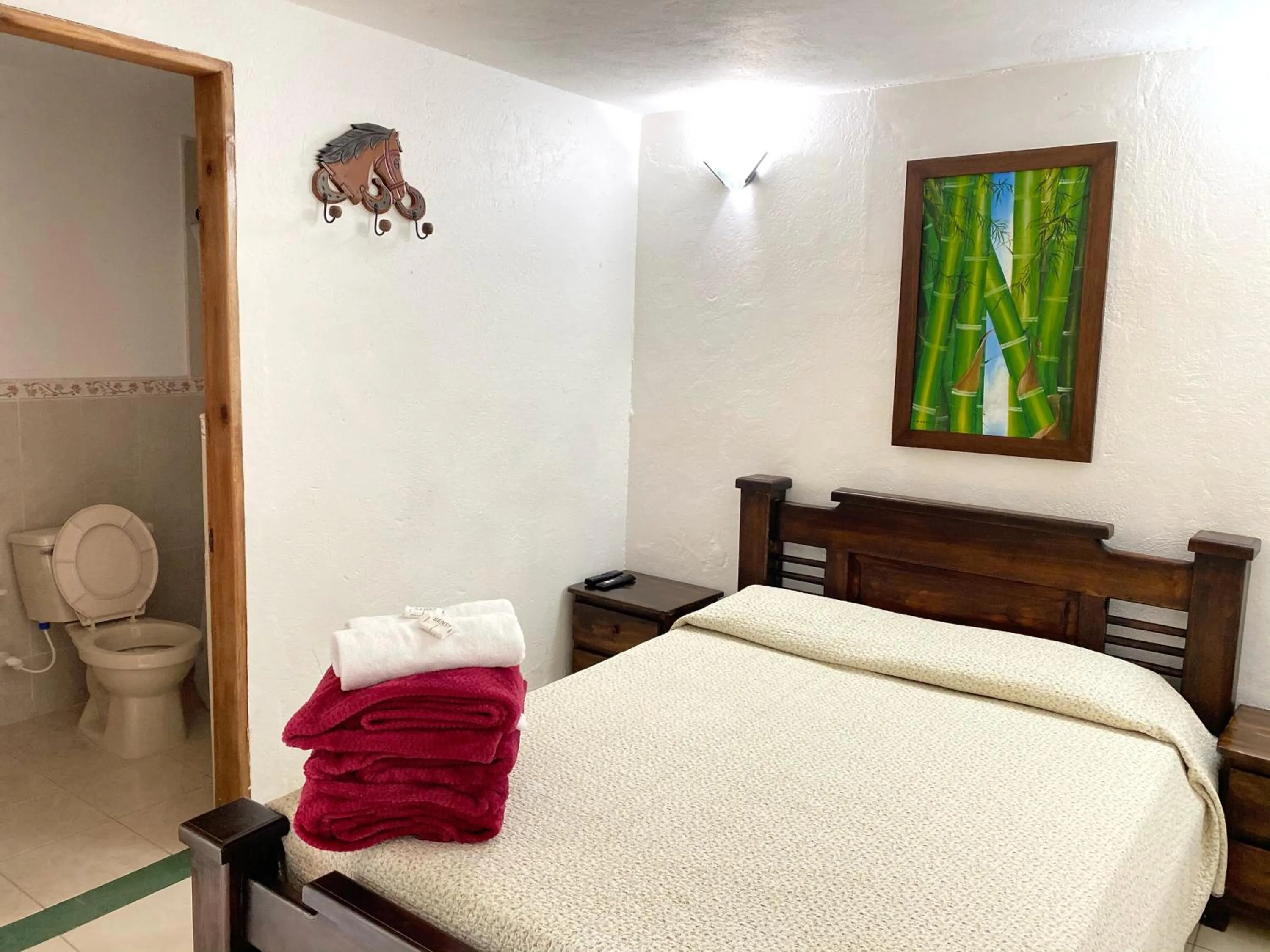 Bed in Finca Hotel La Ponderosa