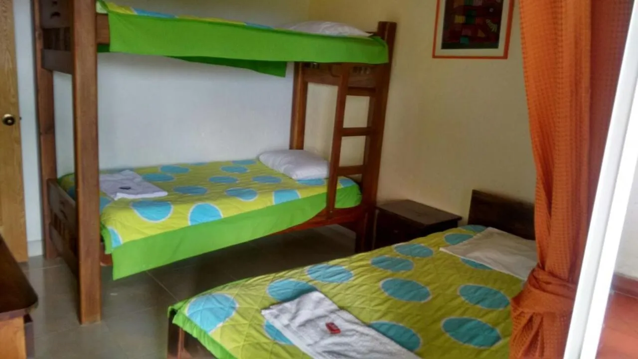Photo of the whole room, Bed in Finca Hotel La Ponderosa