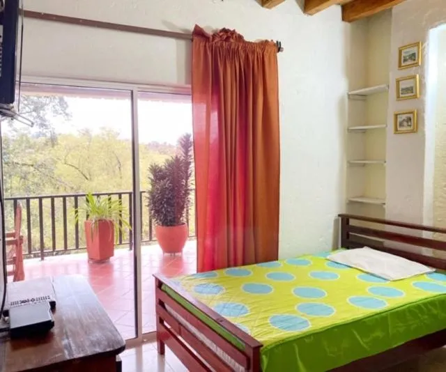Bed in Finca Hotel La Ponderosa