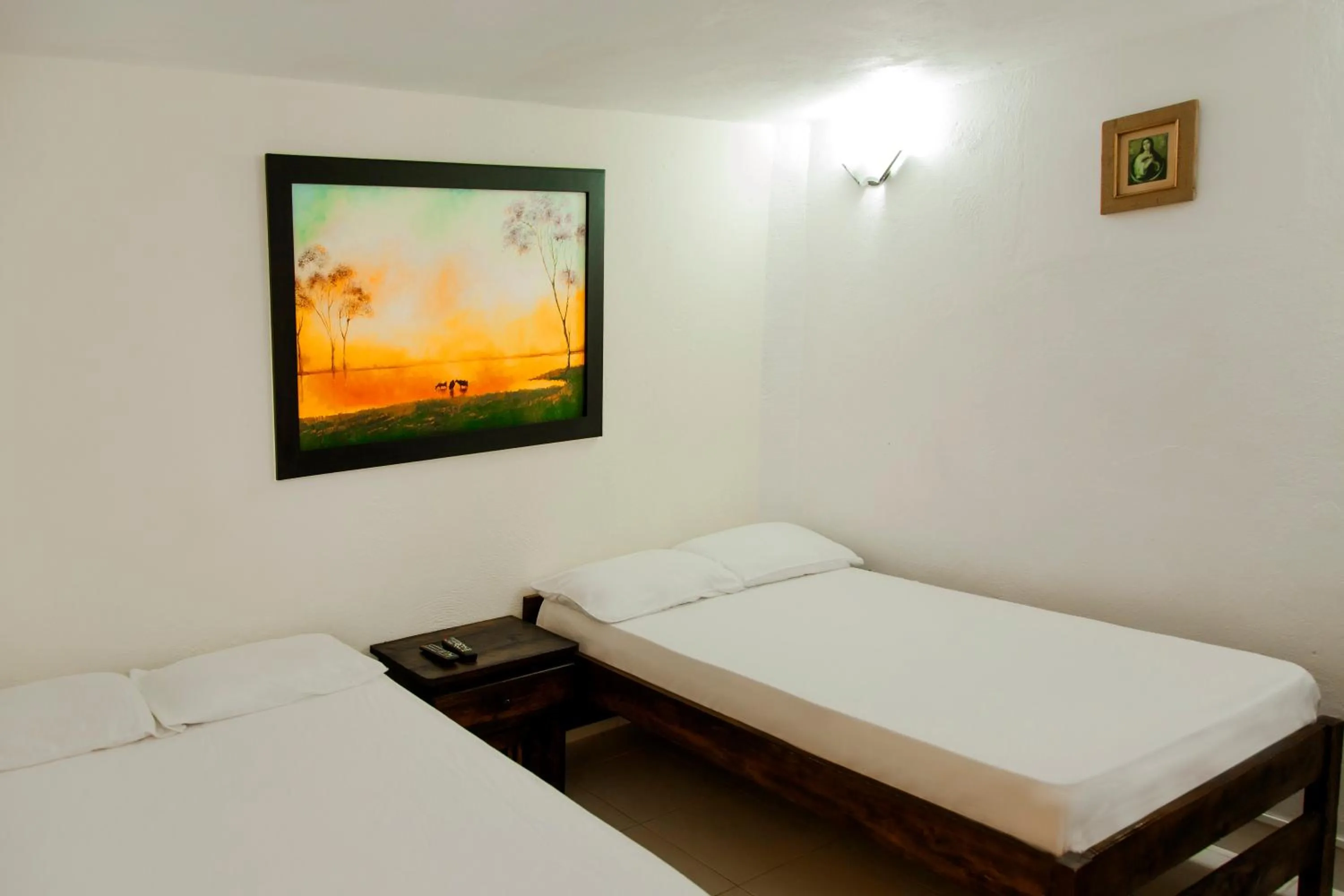 Photo of the whole room, Bed in Finca Hotel La Ponderosa