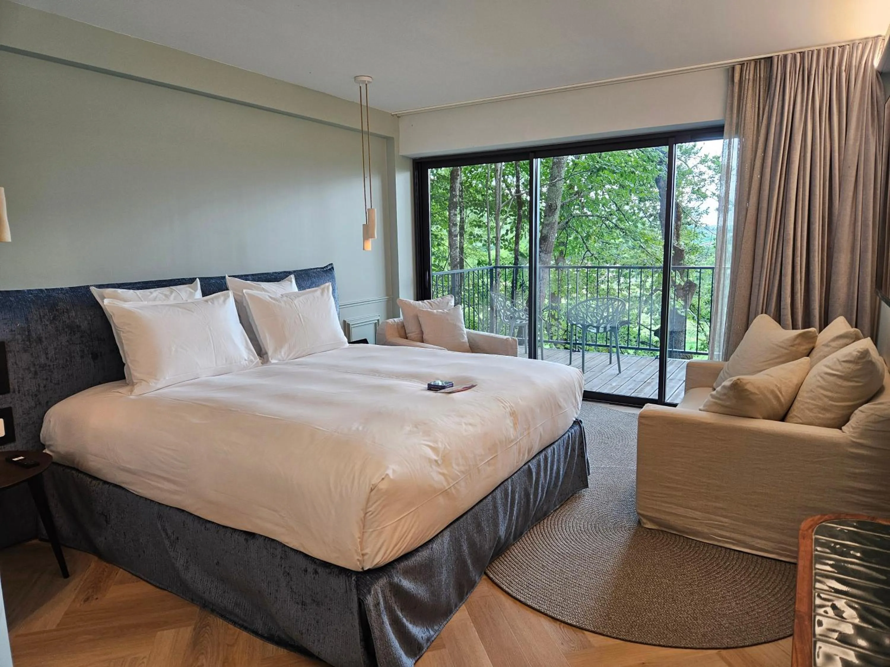 Bed in Le Belvédère Hotel et Bien être