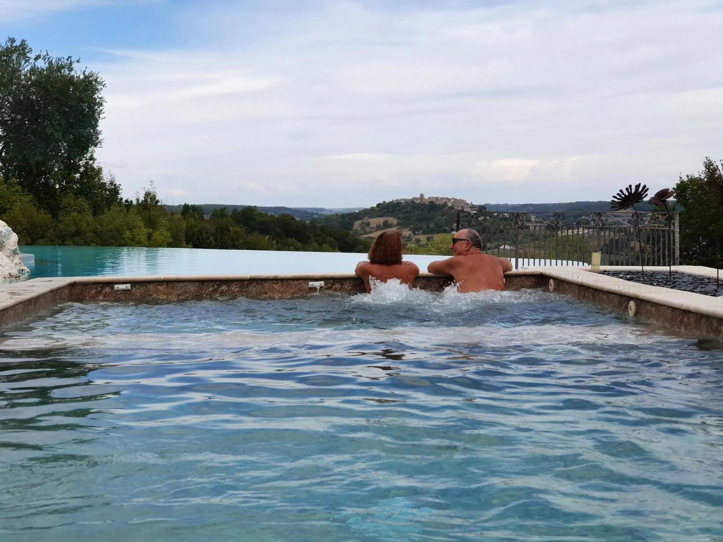 Swimming pool in Le Belvédère Hotel et Bien être