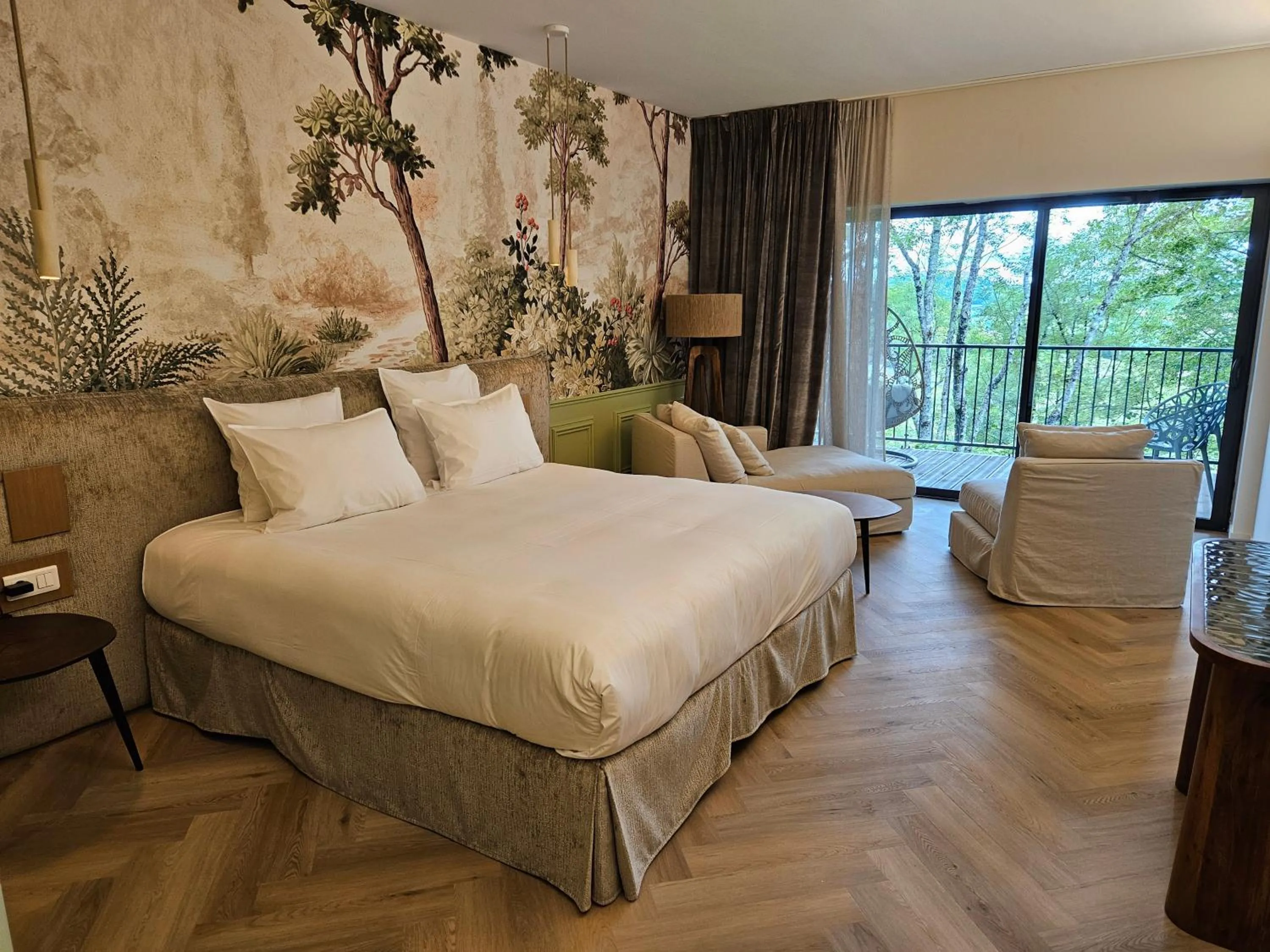 Bed in Le Belvédère Hotel et Bien être